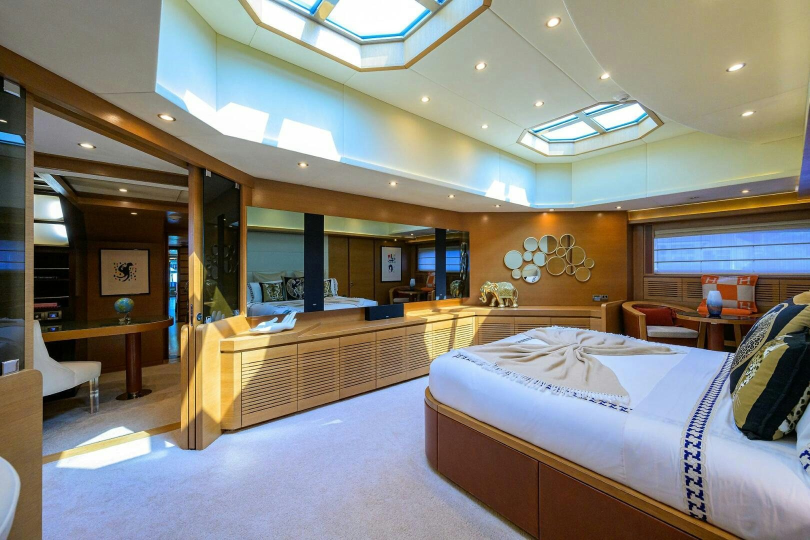 a room with a bed and a desk aboard KIMBERLIE Yacht for Sale