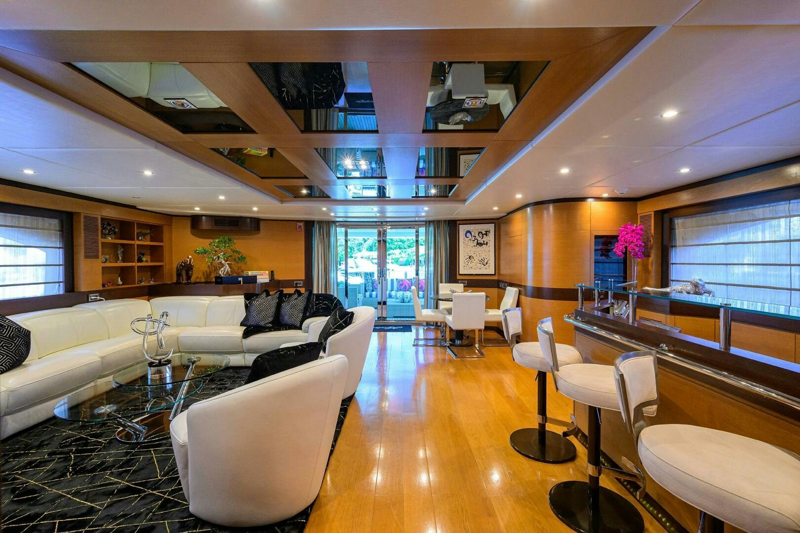 a living room with a large open floor plan aboard KIMBERLIE Yacht for Sale
