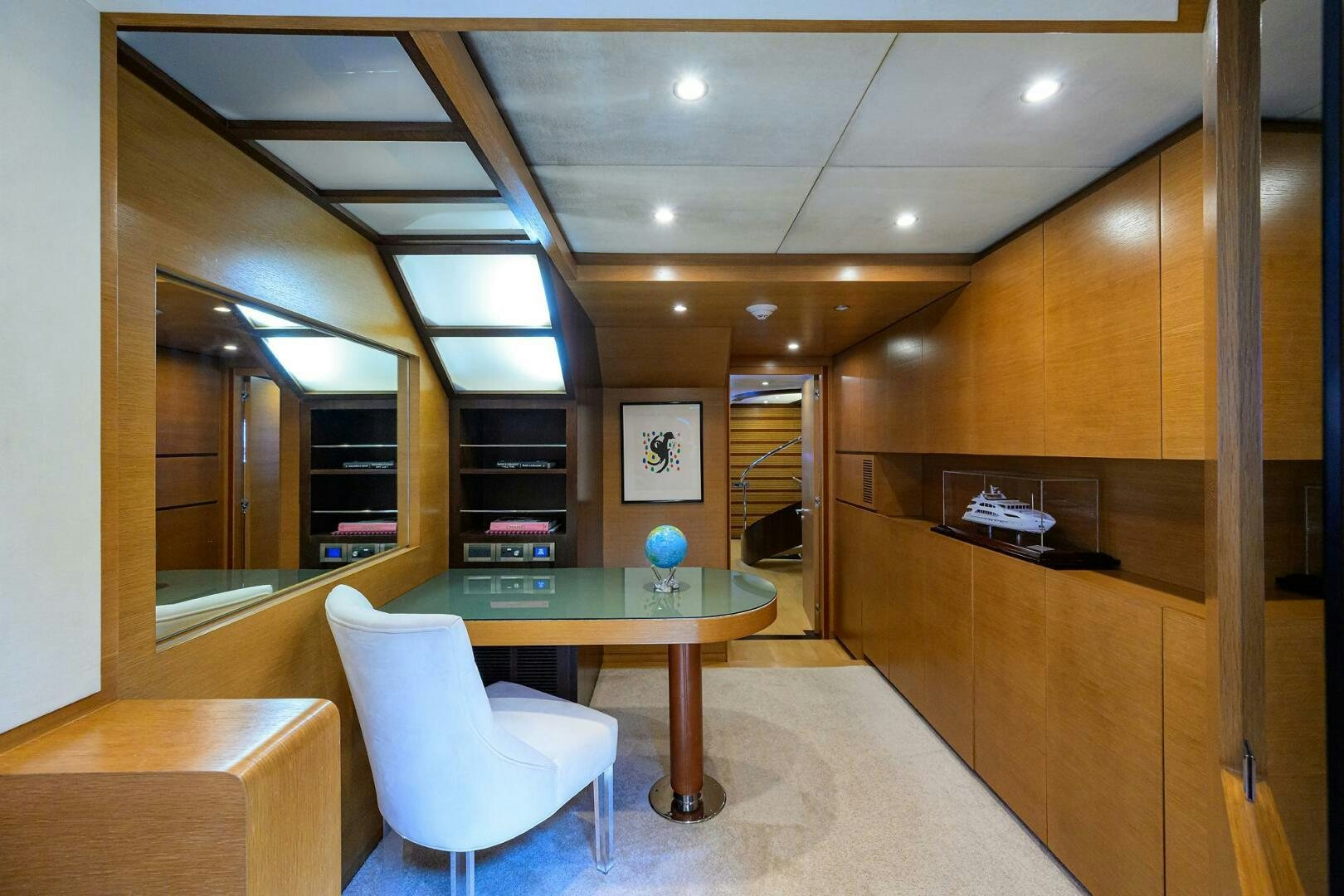 a room with a table and chairs aboard KIMBERLIE Yacht for Sale