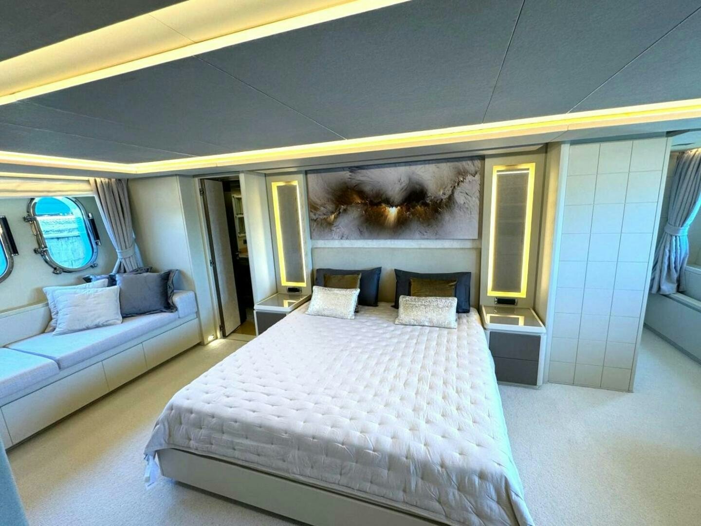 a dog on a bed aboard SERENDIPITY Yacht for Sale