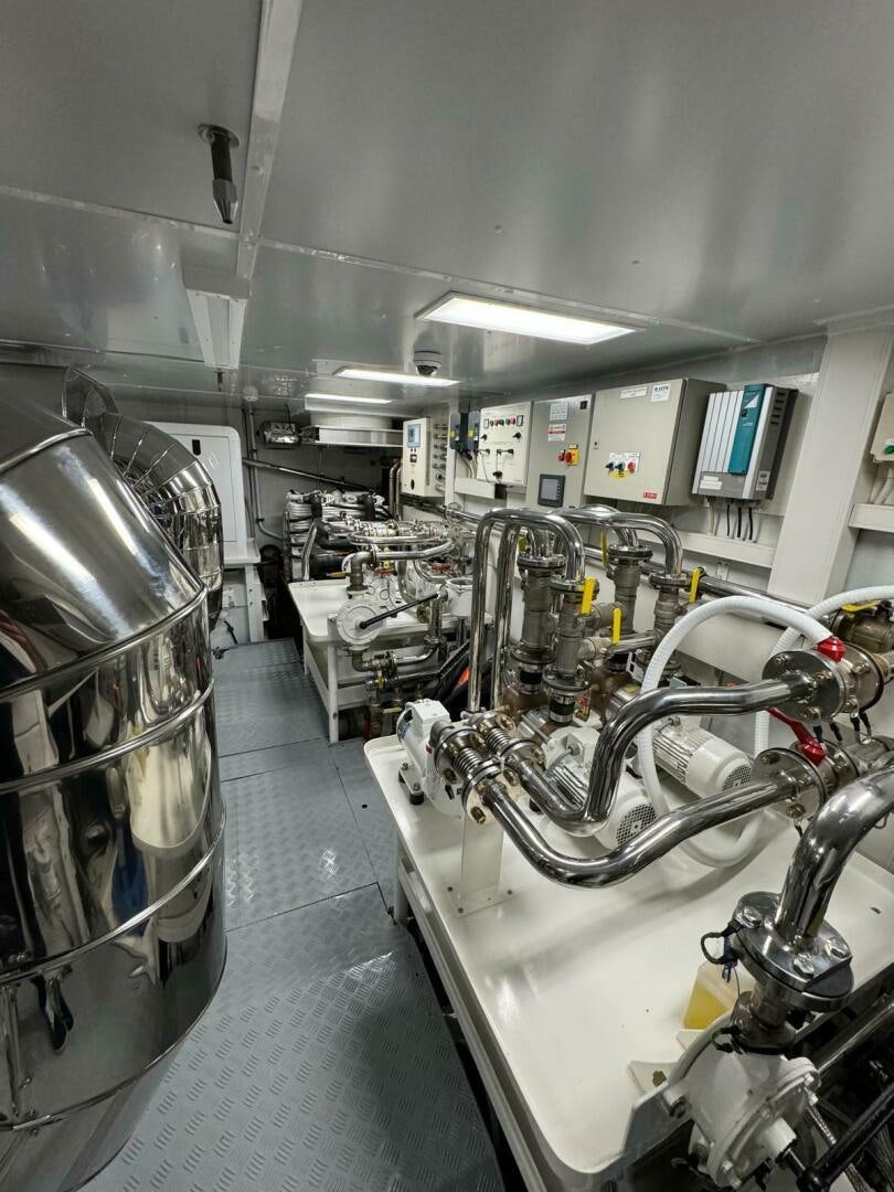 a room with machinery aboard SERENDIPITY Yacht for Sale