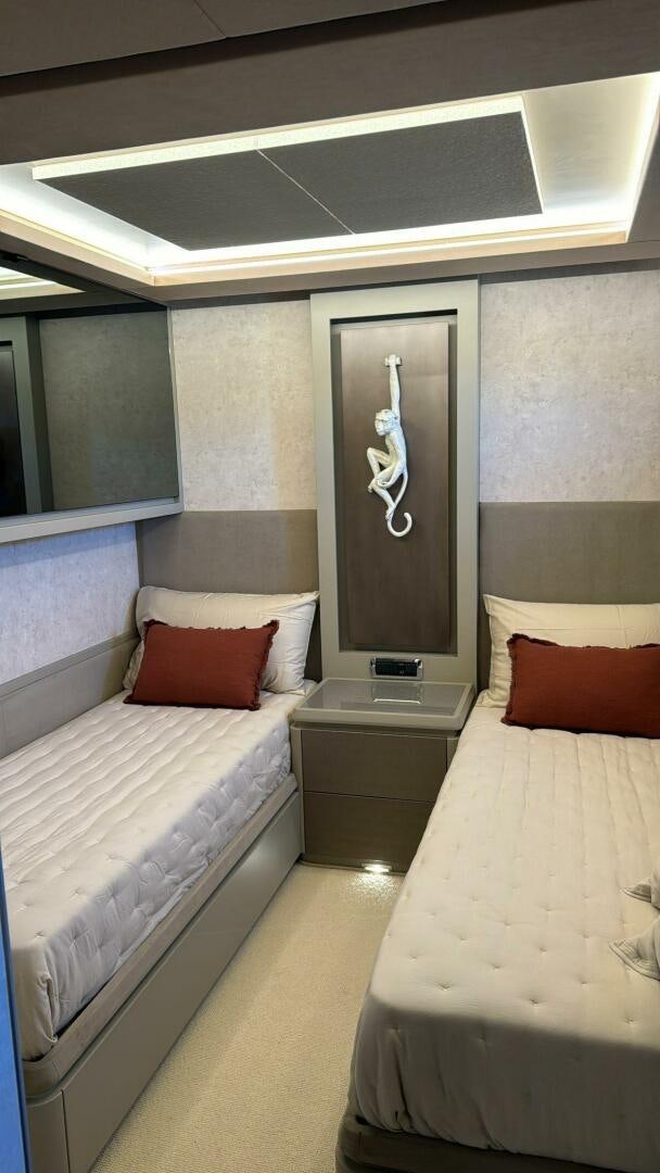a room with two beds aboard SERENDIPITY Yacht for Sale