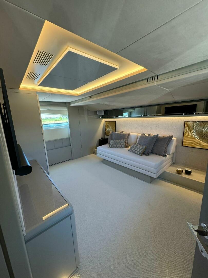 a room with a bed and a window aboard SERENDIPITY Yacht for Sale