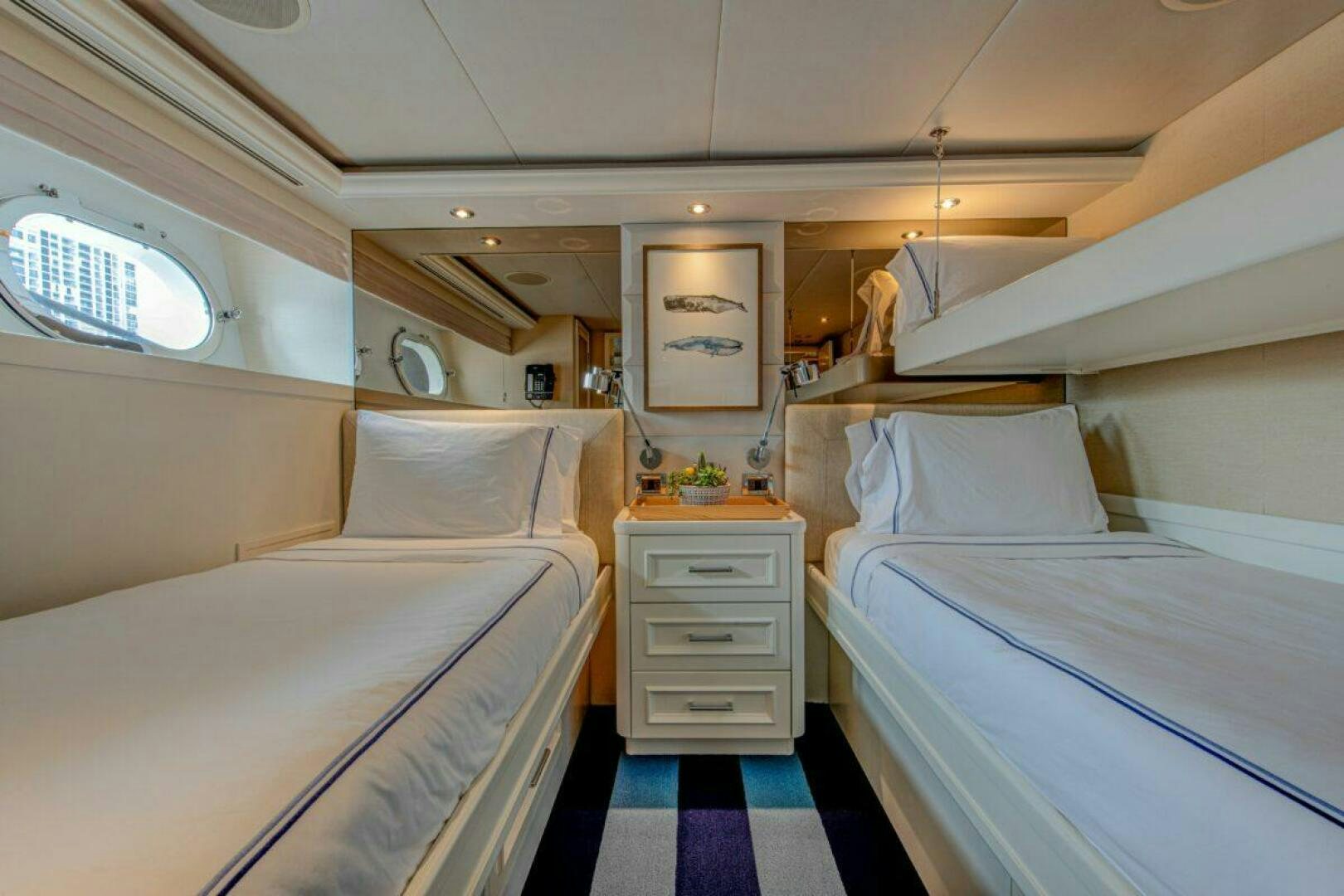 a room with two beds aboard BOXER Yacht for Sale