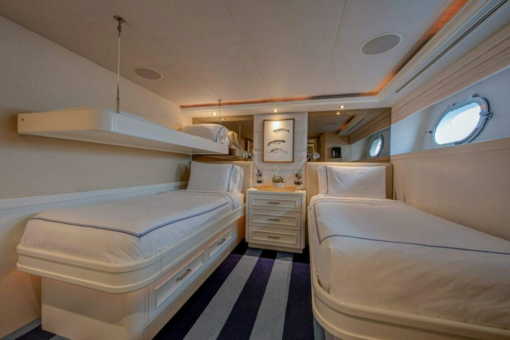 a room with beds and a window aboard BOXER Yacht for Sale