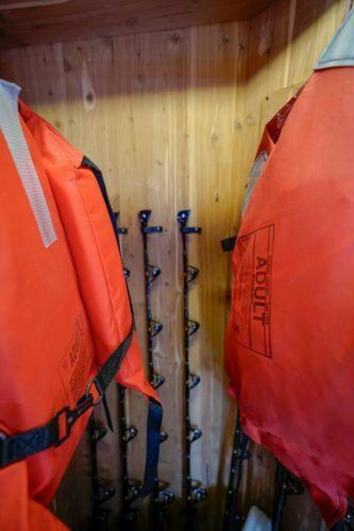 a group of skis leaning against a wall aboard POLE POSITION Yacht for Sale