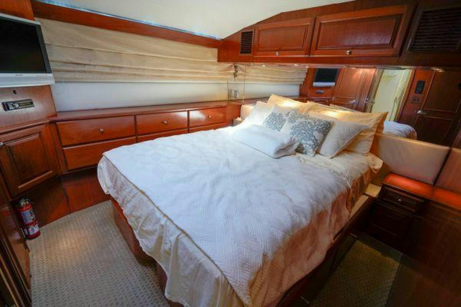 a bed in a room aboard POLE POSITION Yacht for Sale