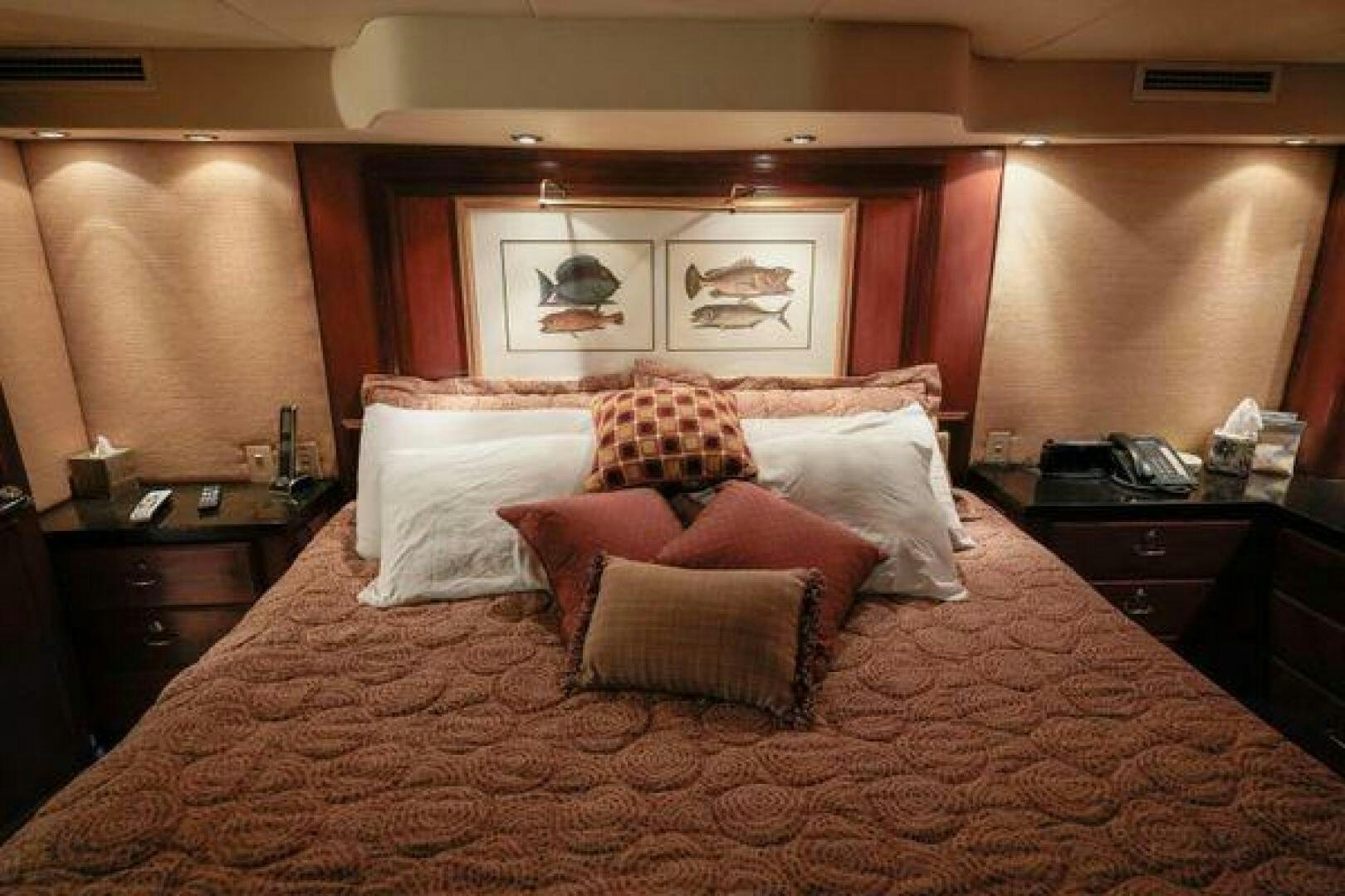 a bed with pillows aboard POLE POSITION Yacht for Sale