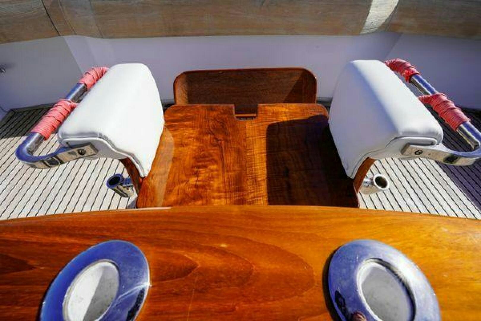 a person's feet on a table aboard POLE POSITION Yacht for Sale