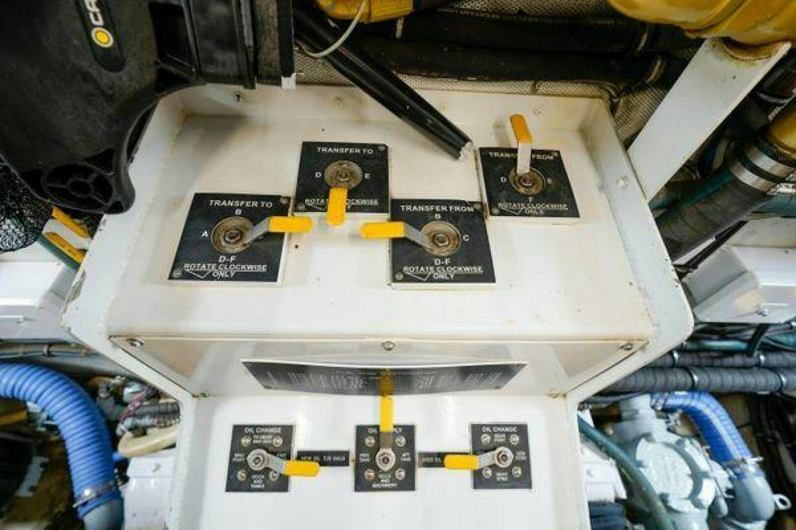 a white machine with yellow and black wires aboard POLE POSITION Yacht for Sale