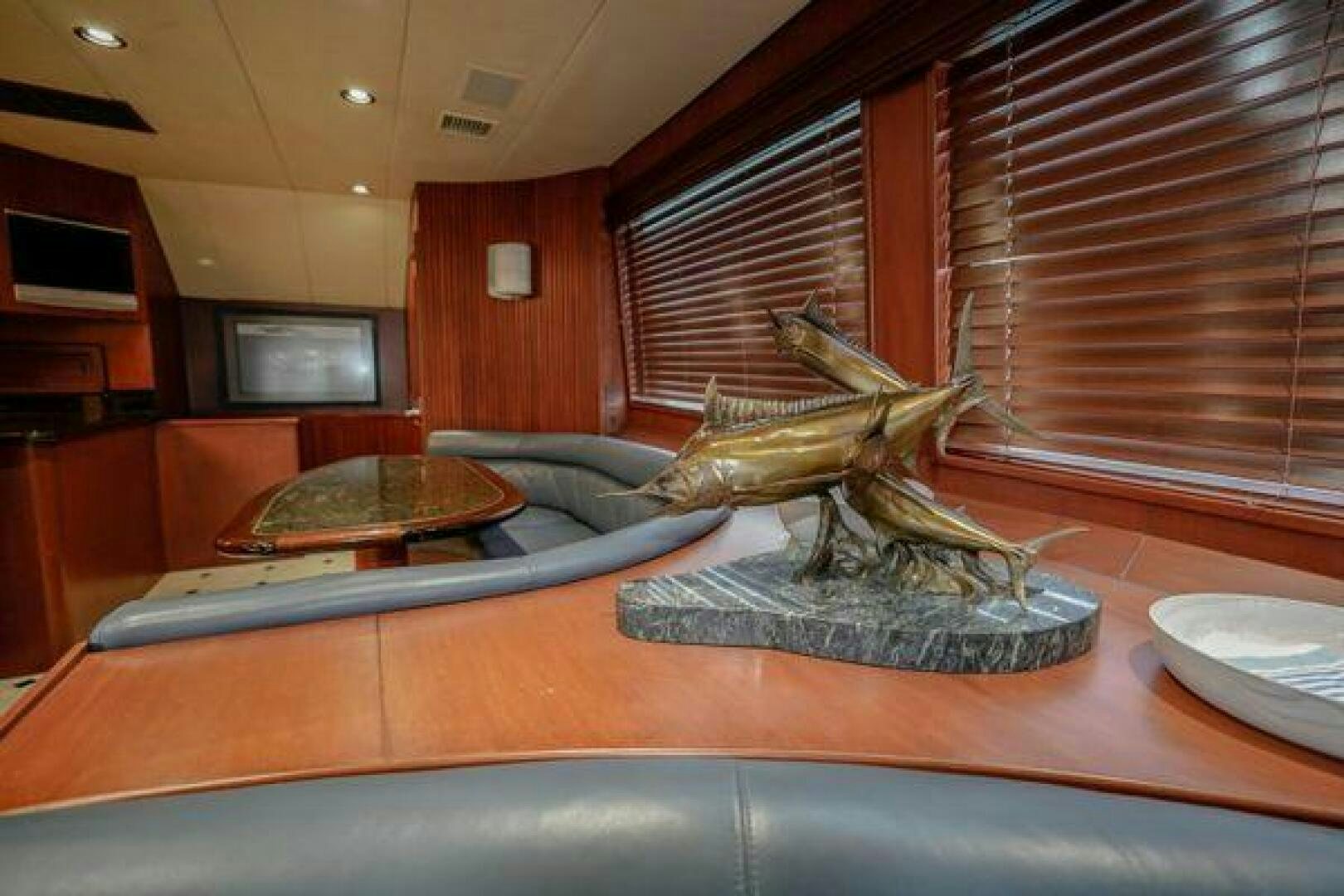 a statue of a dinosaur aboard POLE POSITION Yacht for Sale