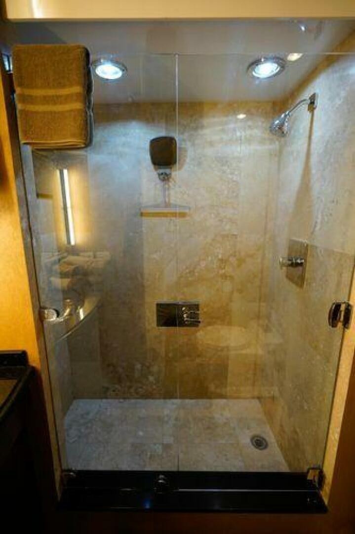 a shower with a towel from it aboard POLE POSITION Yacht for Sale