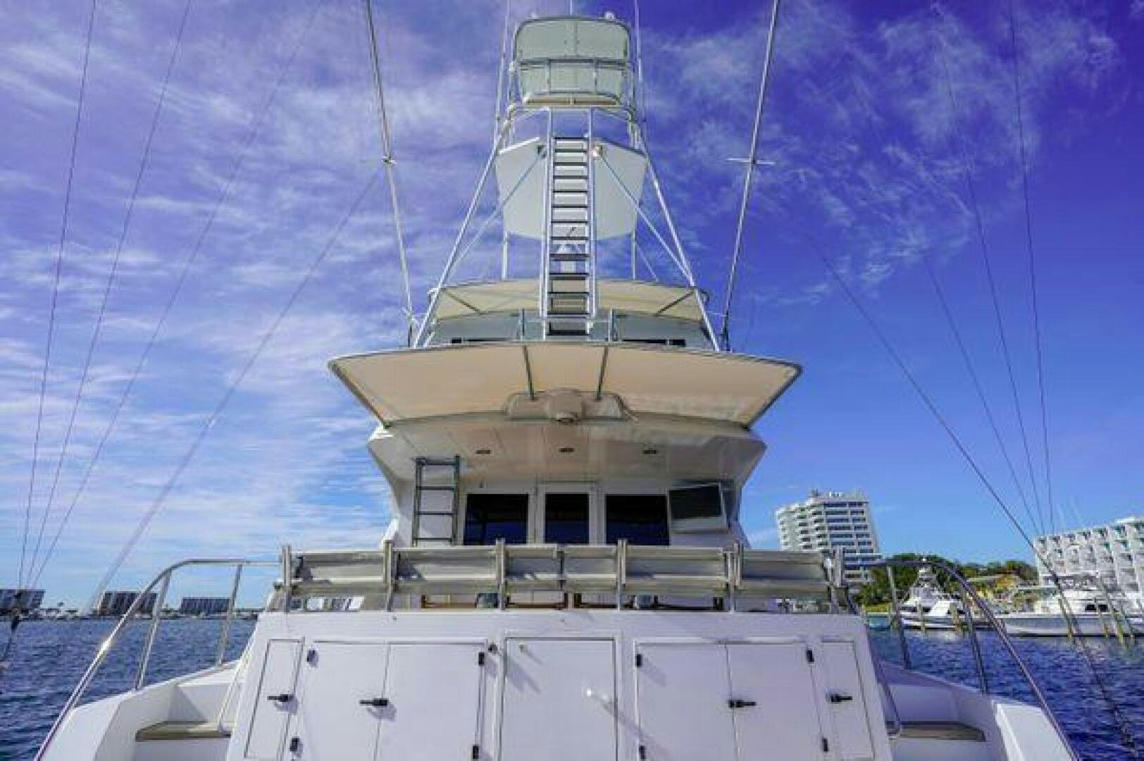 a large white boat with a tower aboard POLE POSITION Yacht for Sale
