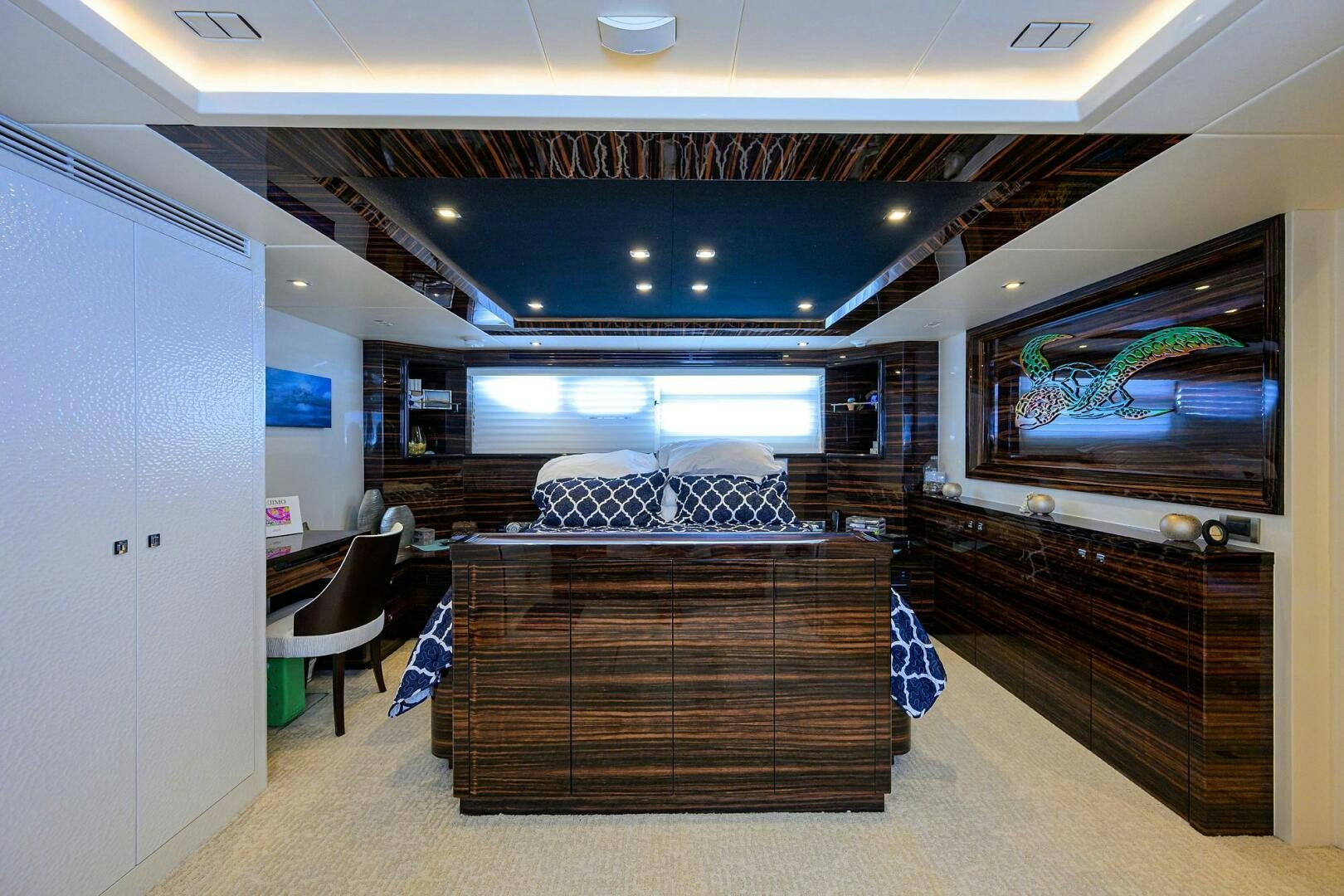 a room with a couch and a tv aboard FUJIMO Yacht for Sale