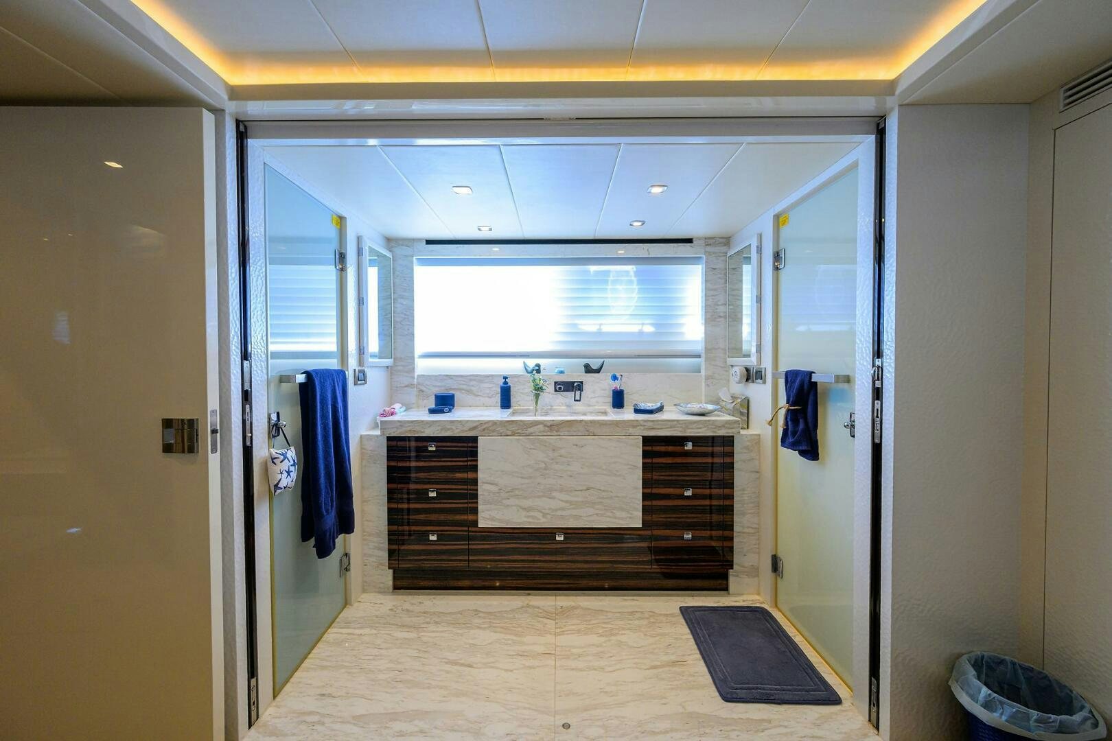 a bathroom with a sink and cabinets aboard FUJIMO Yacht for Sale