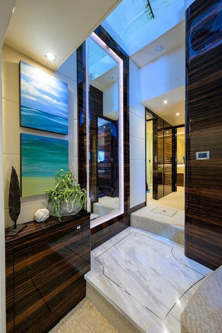 a large bathroom with a large glass shower aboard FUJIMO Yacht for Sale