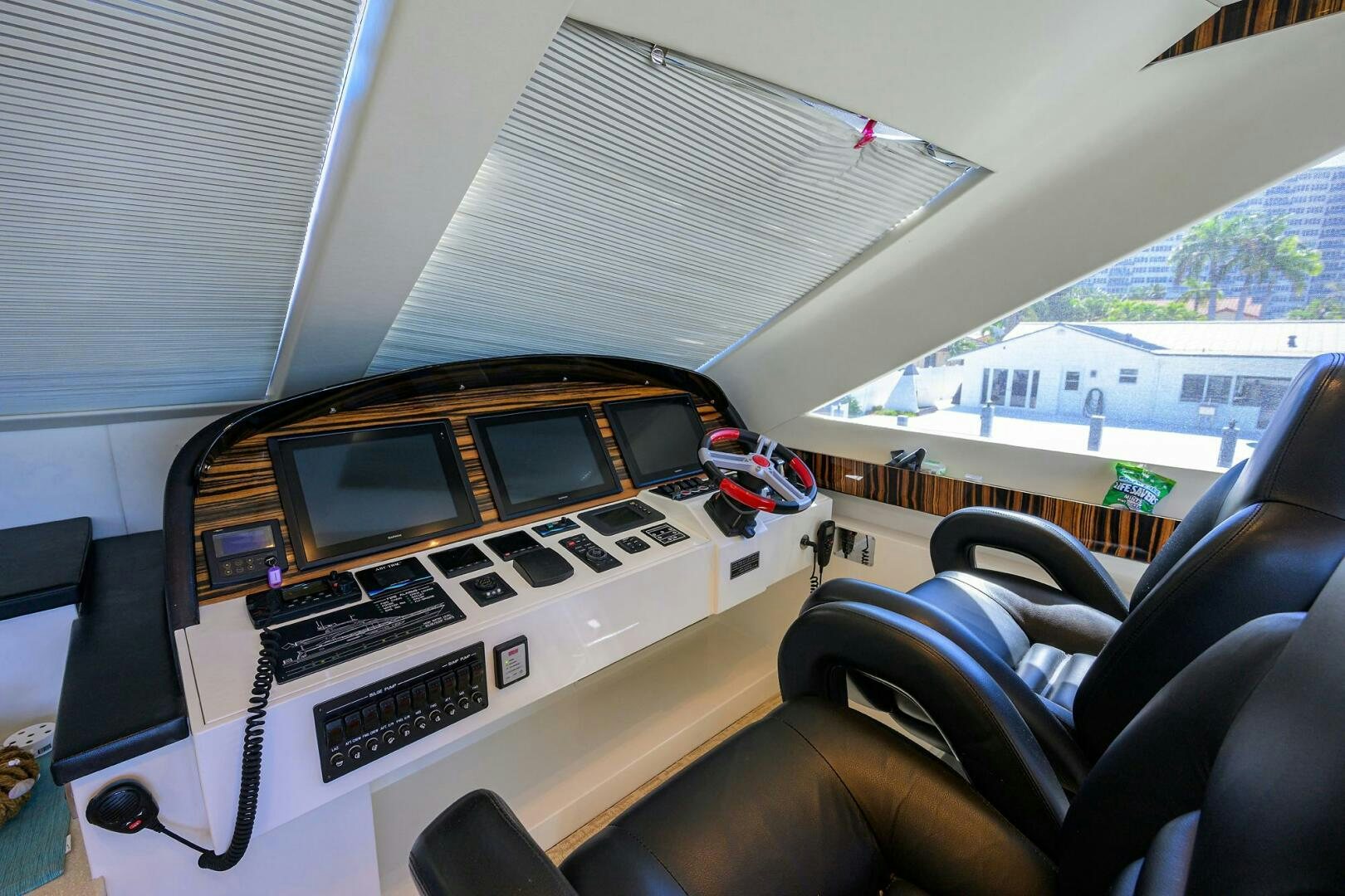 a room with a piano and a couch aboard FUJIMO Yacht for Sale