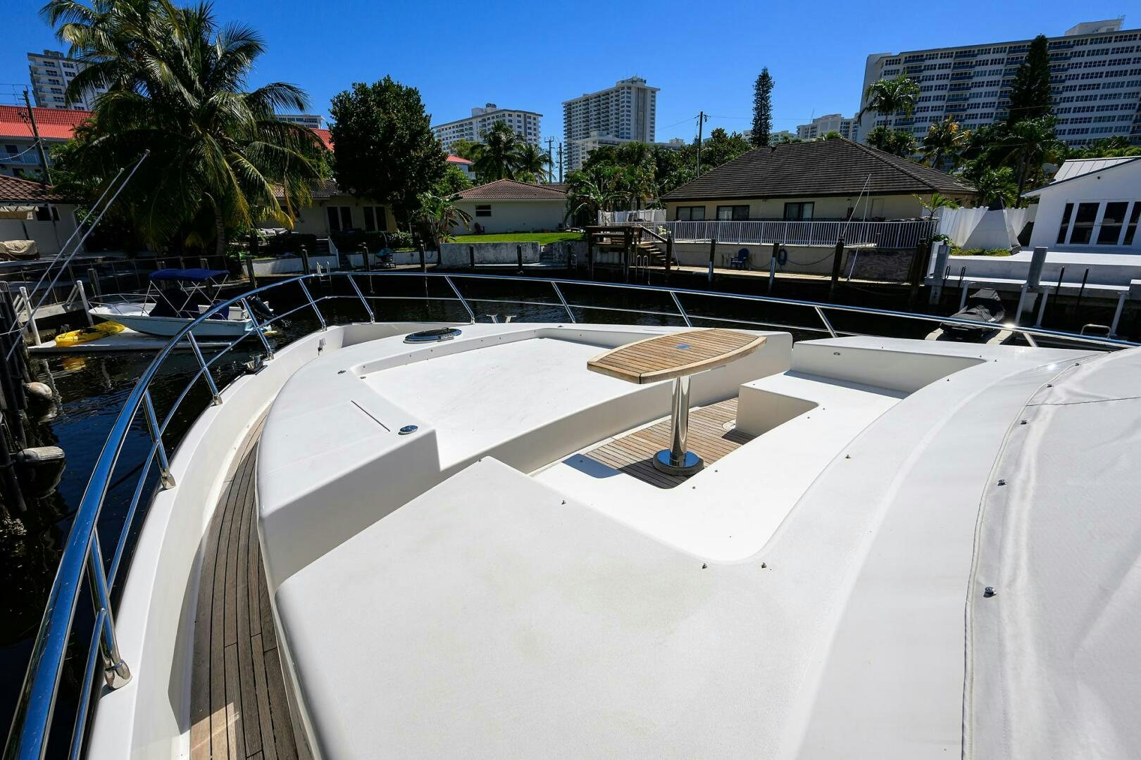 a pool with a building in the background aboard FUJIMO Yacht for Sale