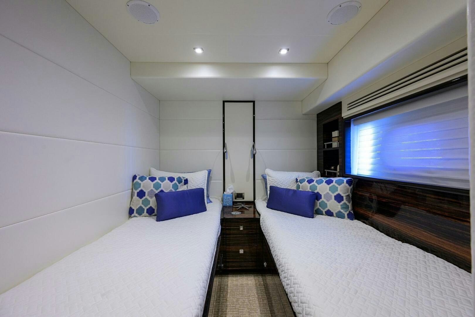 a room with a bed and a tv aboard FUJIMO Yacht for Sale