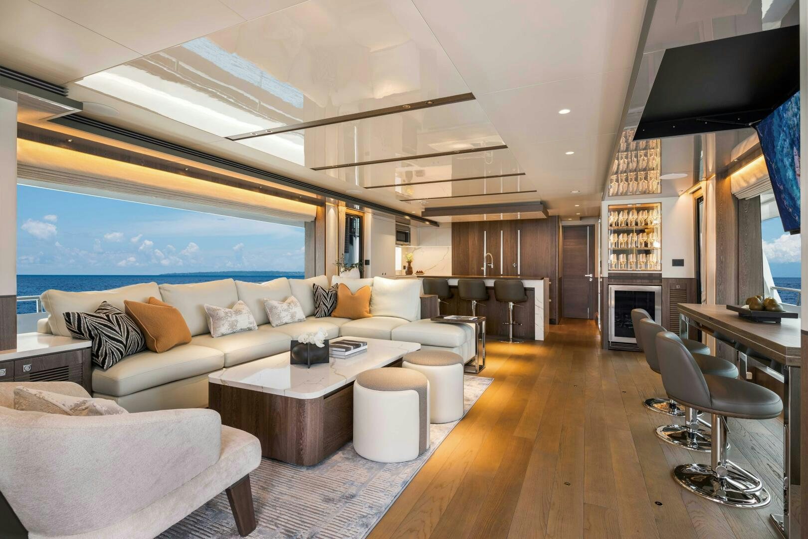 a living room with a large screen aboard FD80-614 Yacht for Sale