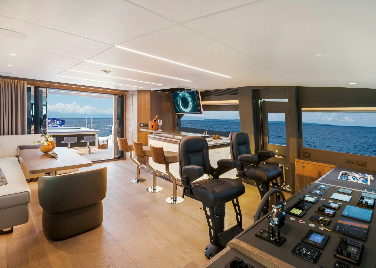 a room with a table chairs and a large window aboard FD80-614 Yacht for Sale