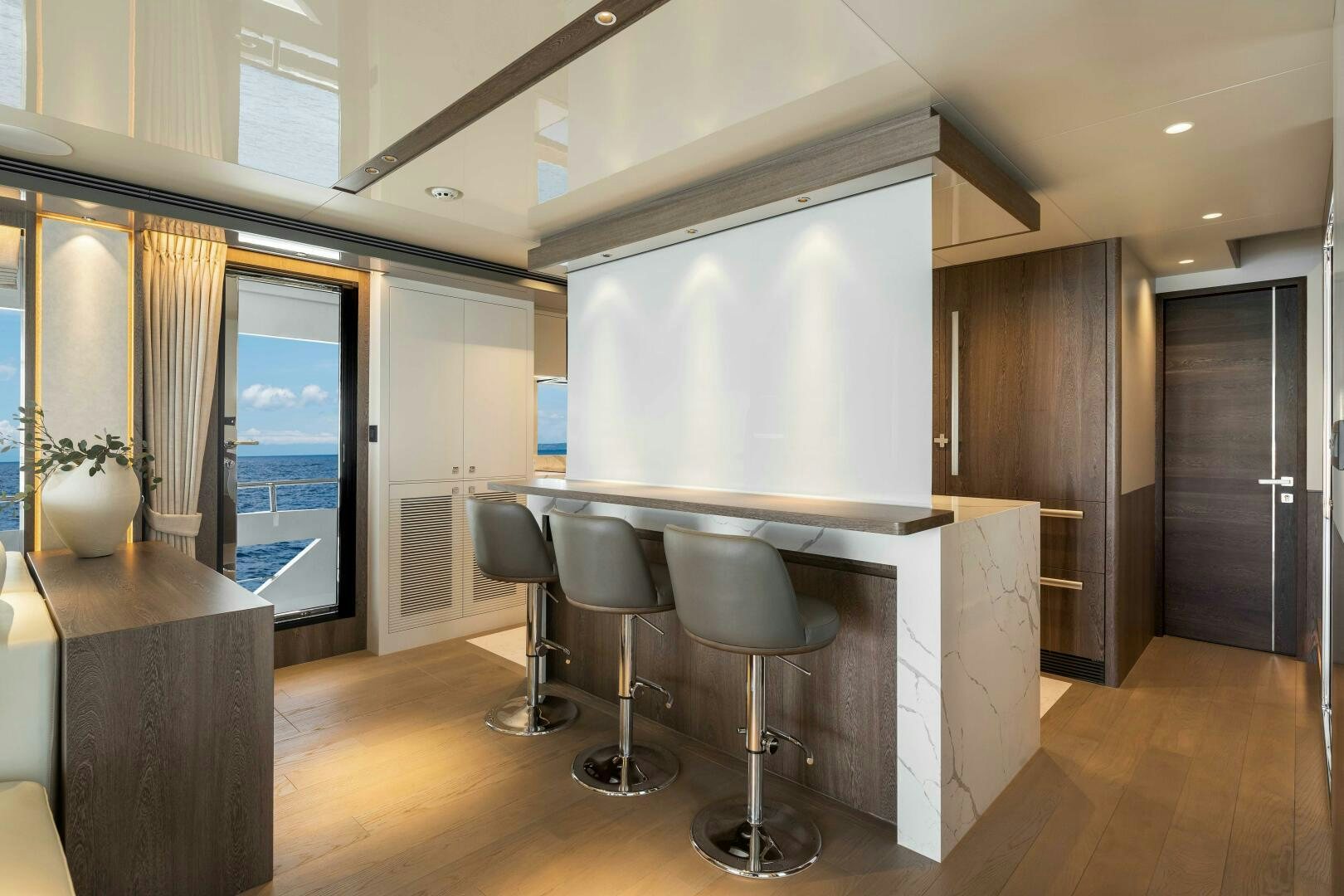 a room with a desk and chairs aboard FD80-614 Yacht for Sale