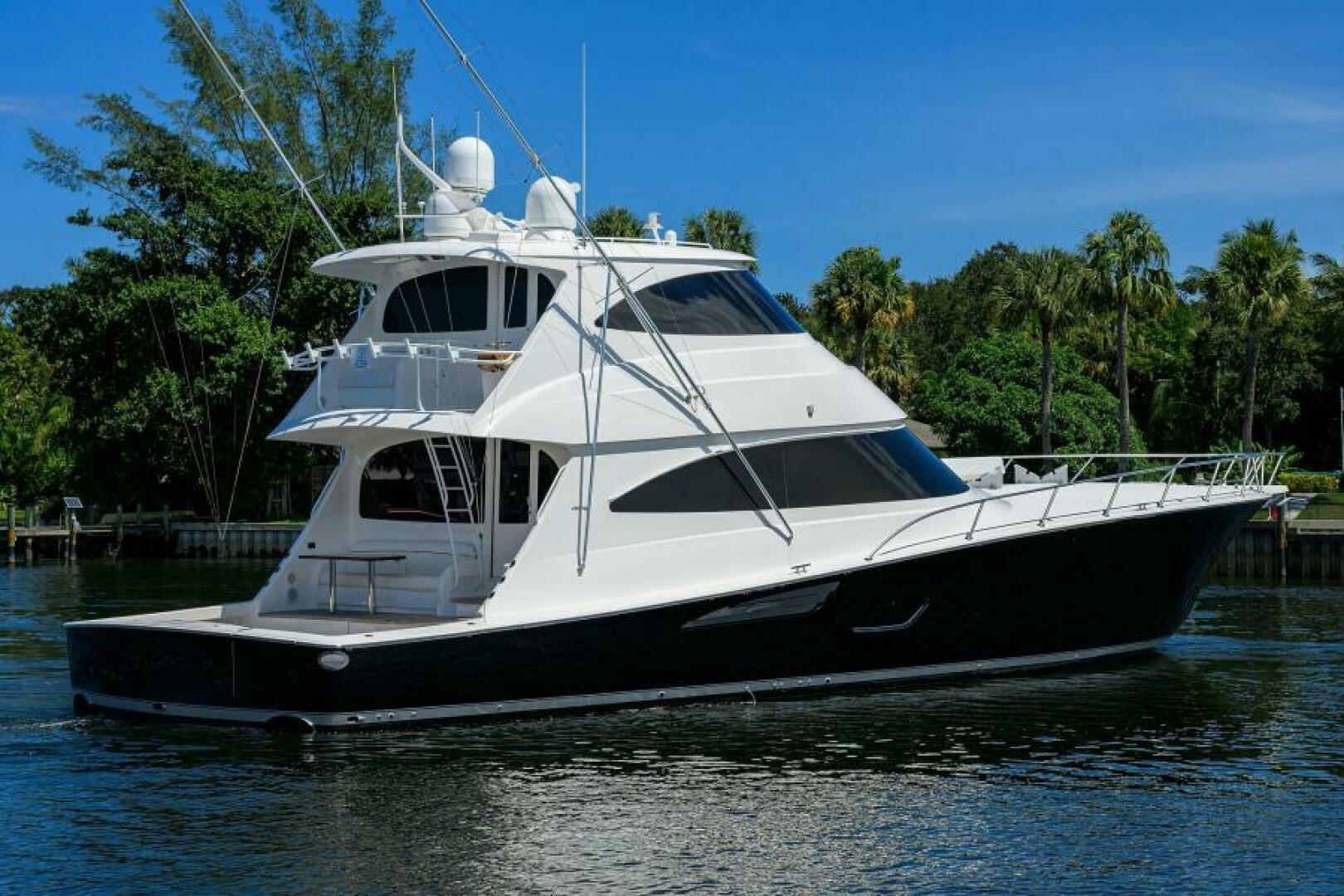 a white boat on the water aboard MIRAGE DELETE Yacht for Sale