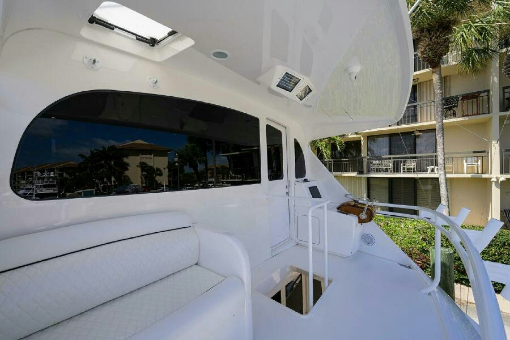 a white vehicle with a large window aboard MIRAGE DELETE Yacht for Sale
