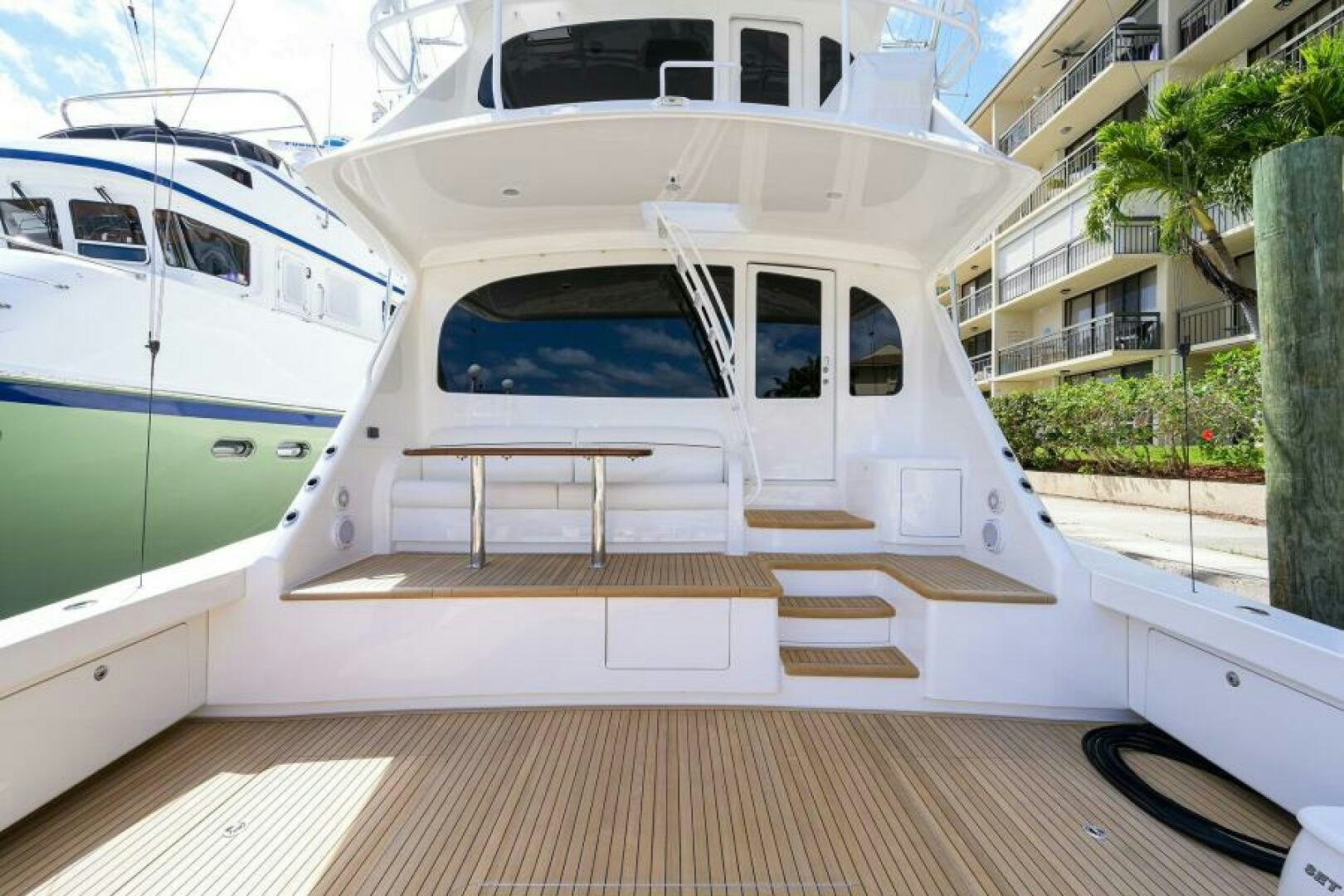 a white boat on a deck aboard MIRAGE DELETE Yacht for Sale