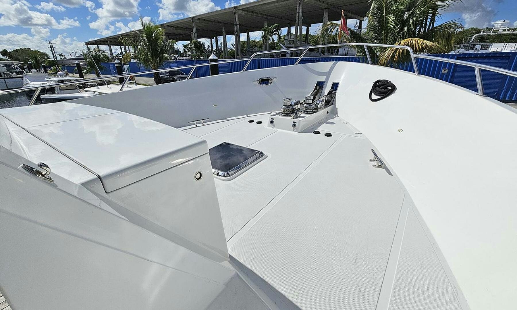 a white boat with a black and white boat on it aboard MY KIMBERLY Yacht for Sale