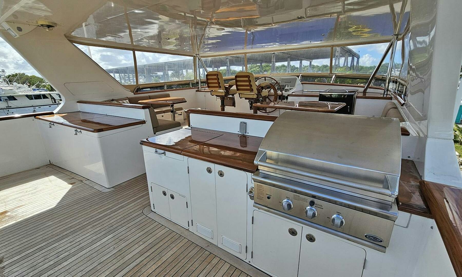 a room with a table and chairs aboard MY KIMBERLY Yacht for Sale