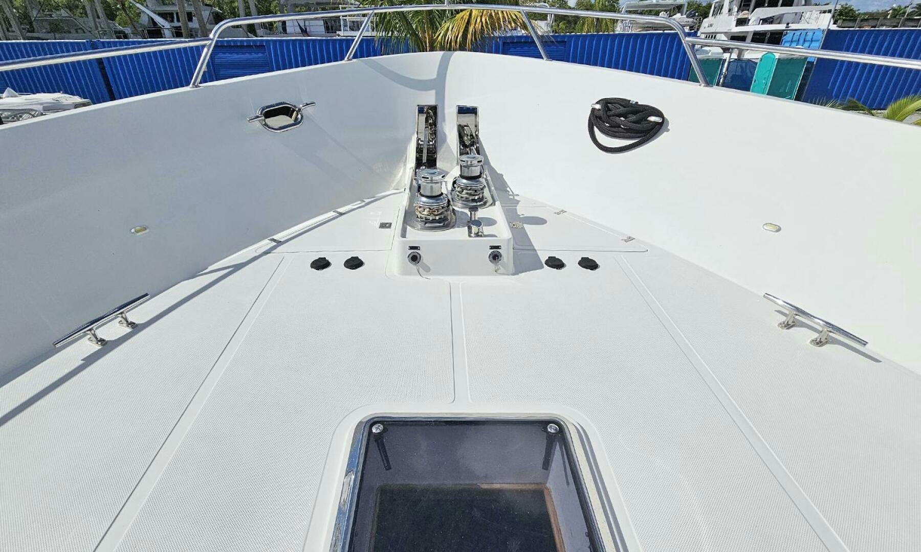 a white vehicle with black wheels aboard MY KIMBERLY Yacht for Sale