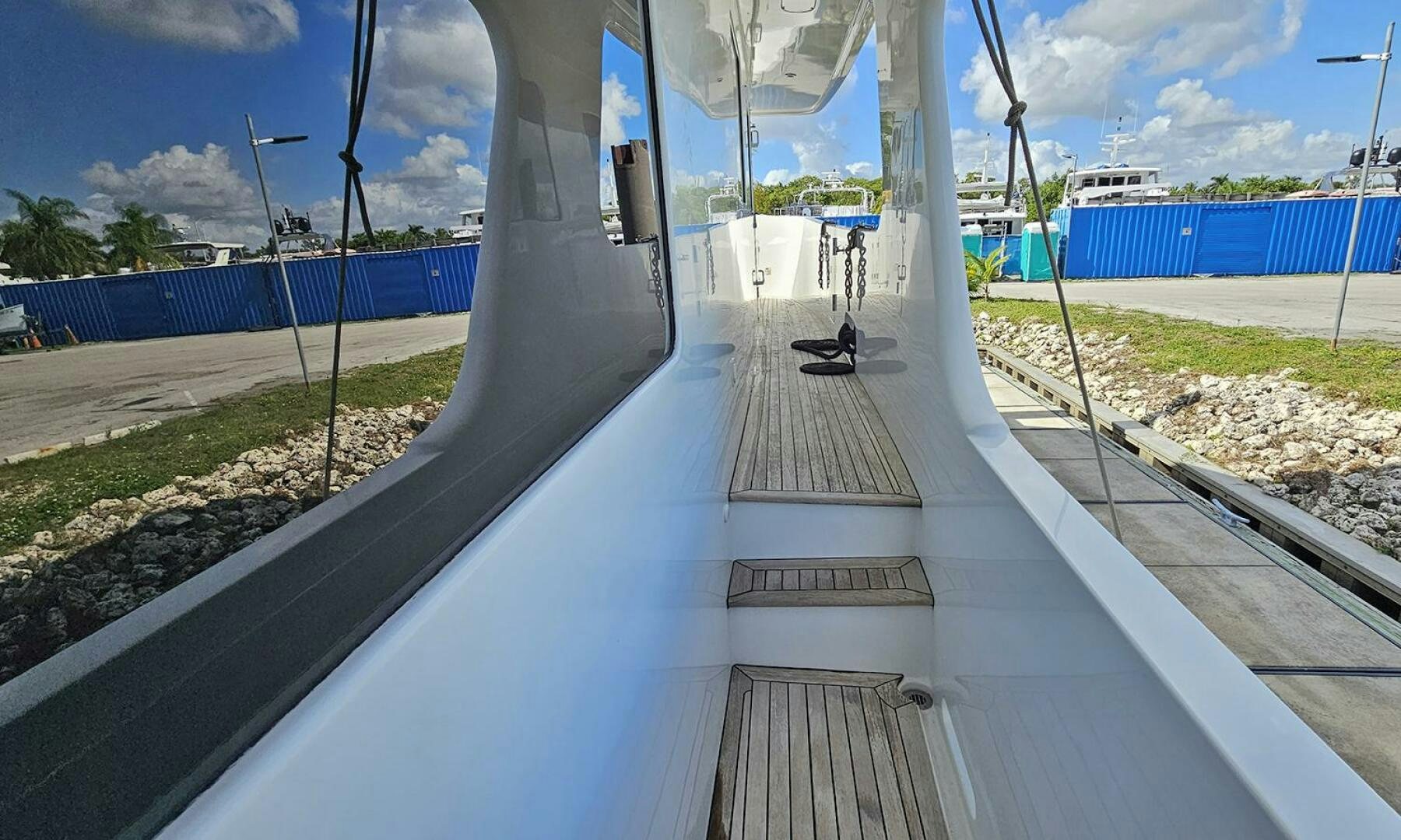 a long wooden walkway aboard MY KIMBERLY Yacht for Sale