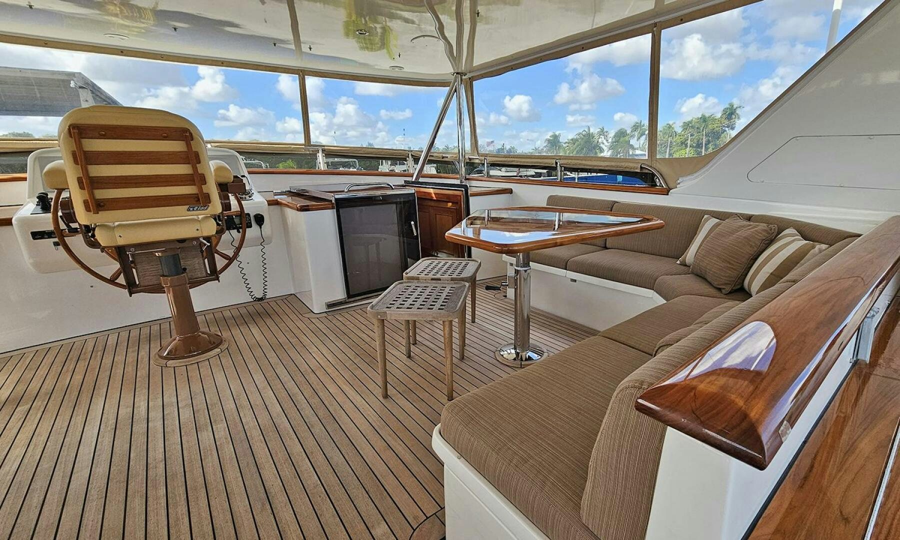 a room with a couch and a table and chairs aboard MY KIMBERLY Yacht for Sale