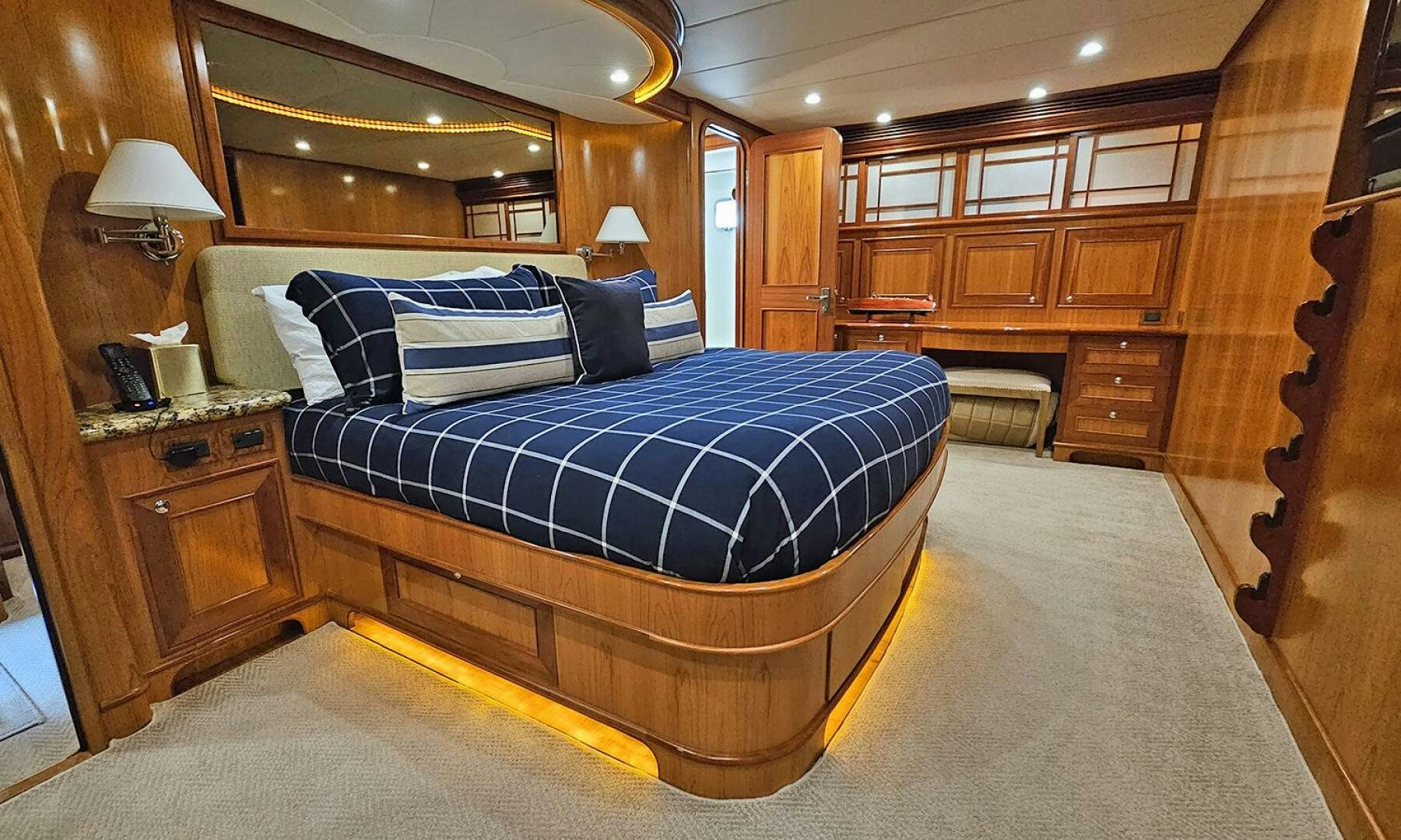 a bed in a room aboard MY KIMBERLY Yacht for Sale