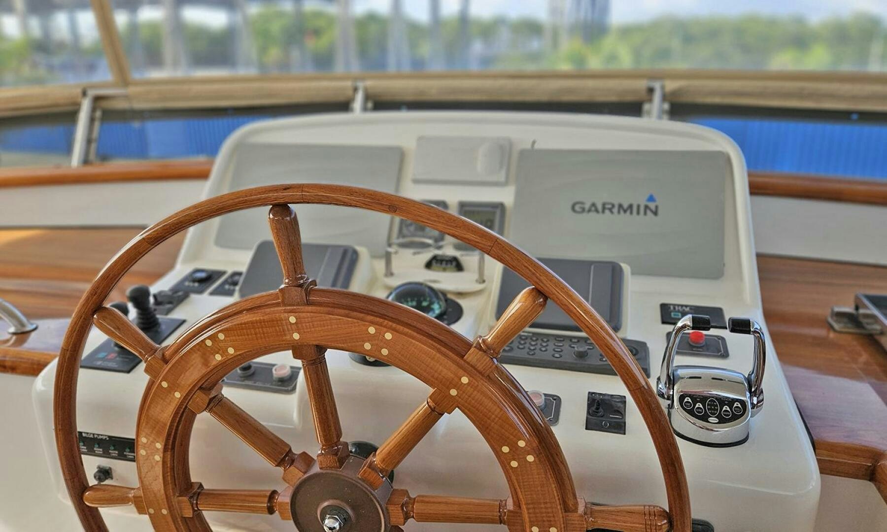 a wooden steering wheel aboard MY KIMBERLY Yacht for Sale