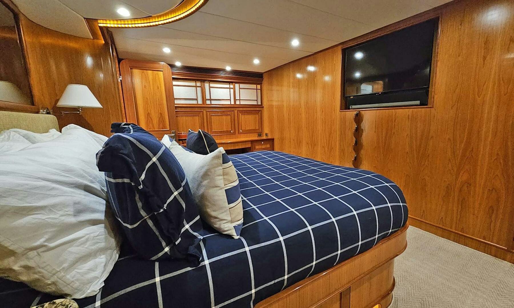 a bed in a room aboard MY KIMBERLY Yacht for Sale