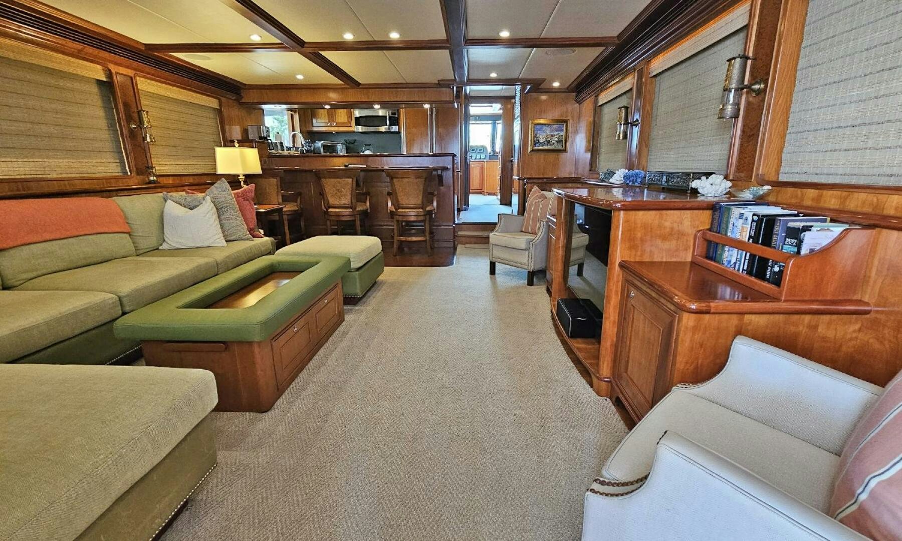 a living room with couches and a table aboard MY KIMBERLY Yacht for Sale