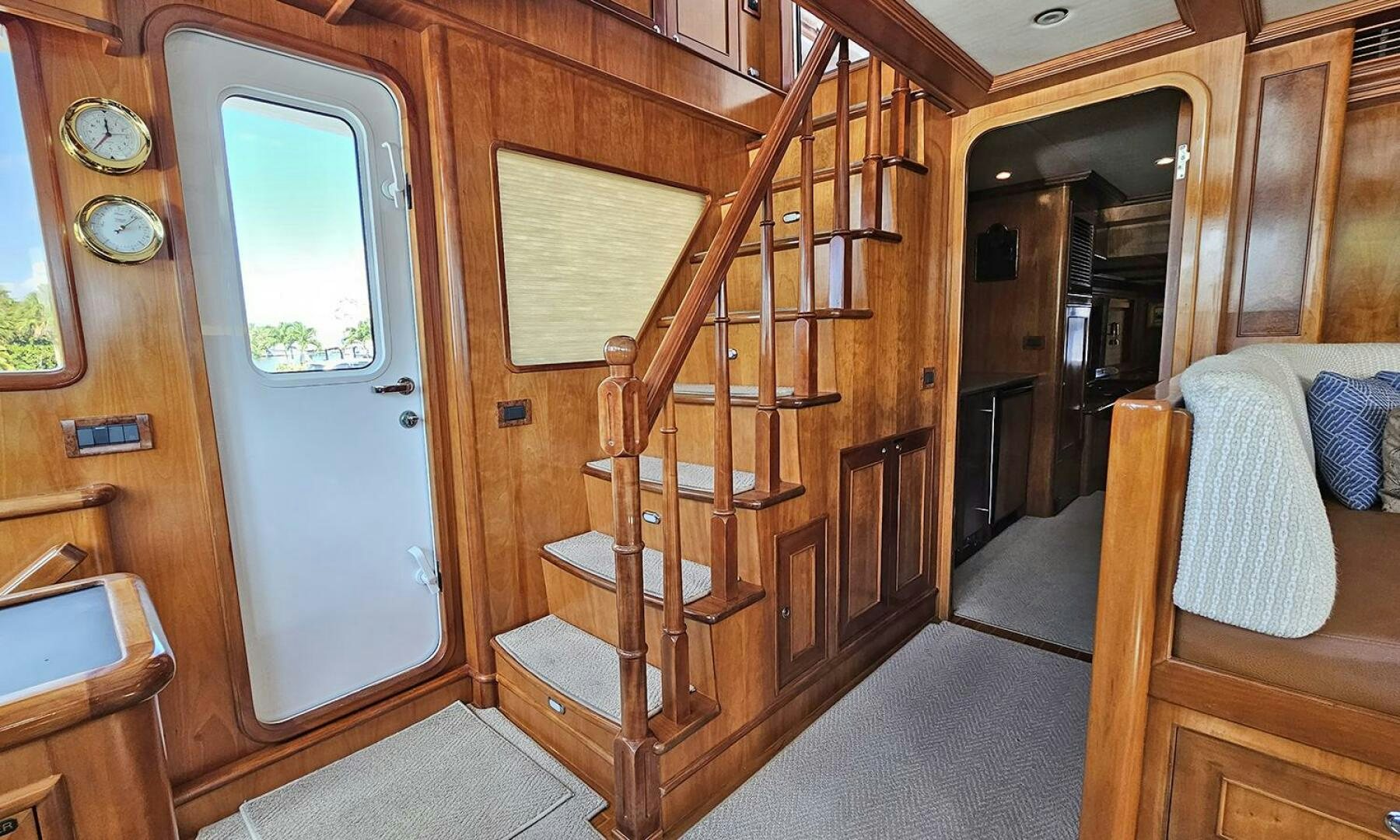 a room with a bed and a door aboard MY KIMBERLY Yacht for Sale