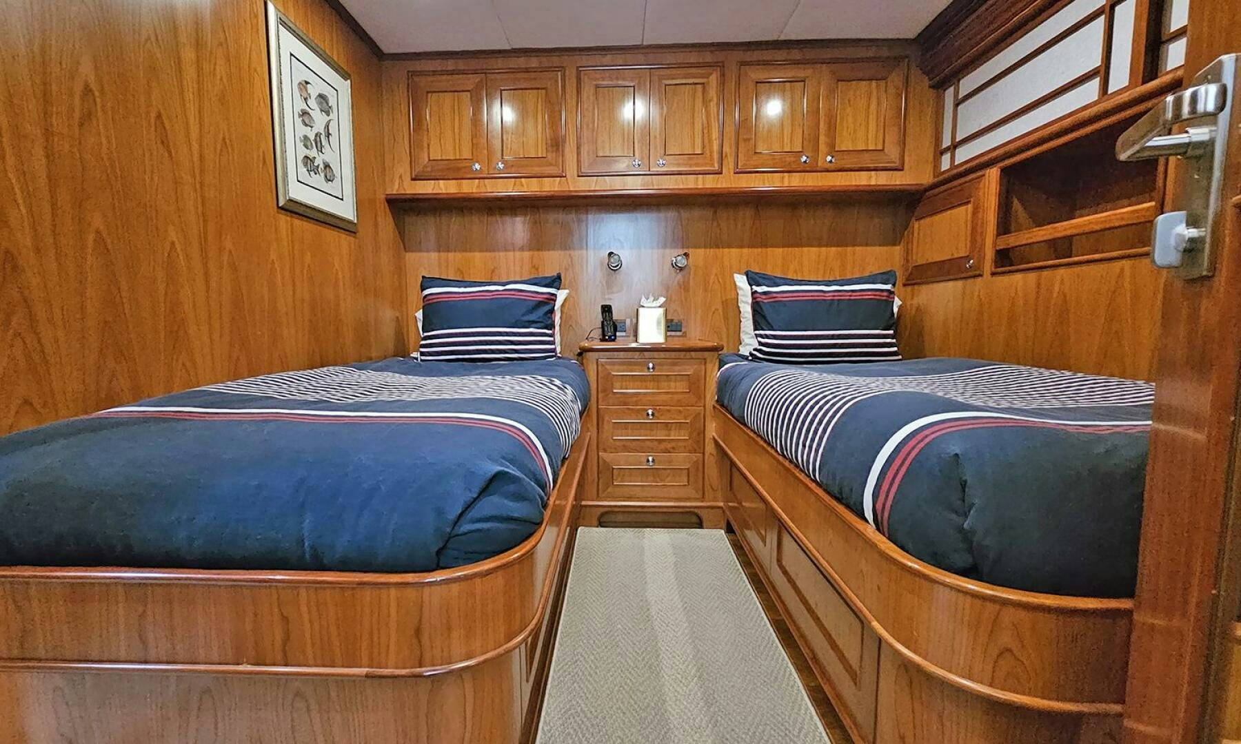 a couple of beds in a room aboard MY KIMBERLY Yacht for Sale