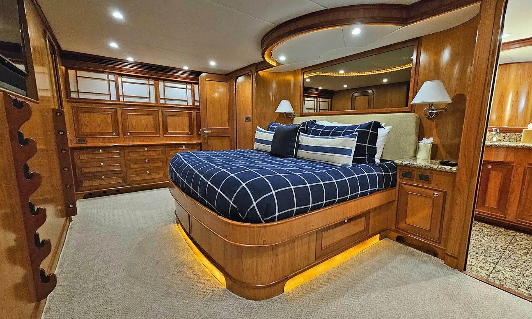 a bed in a room aboard MY KIMBERLY Yacht for Sale