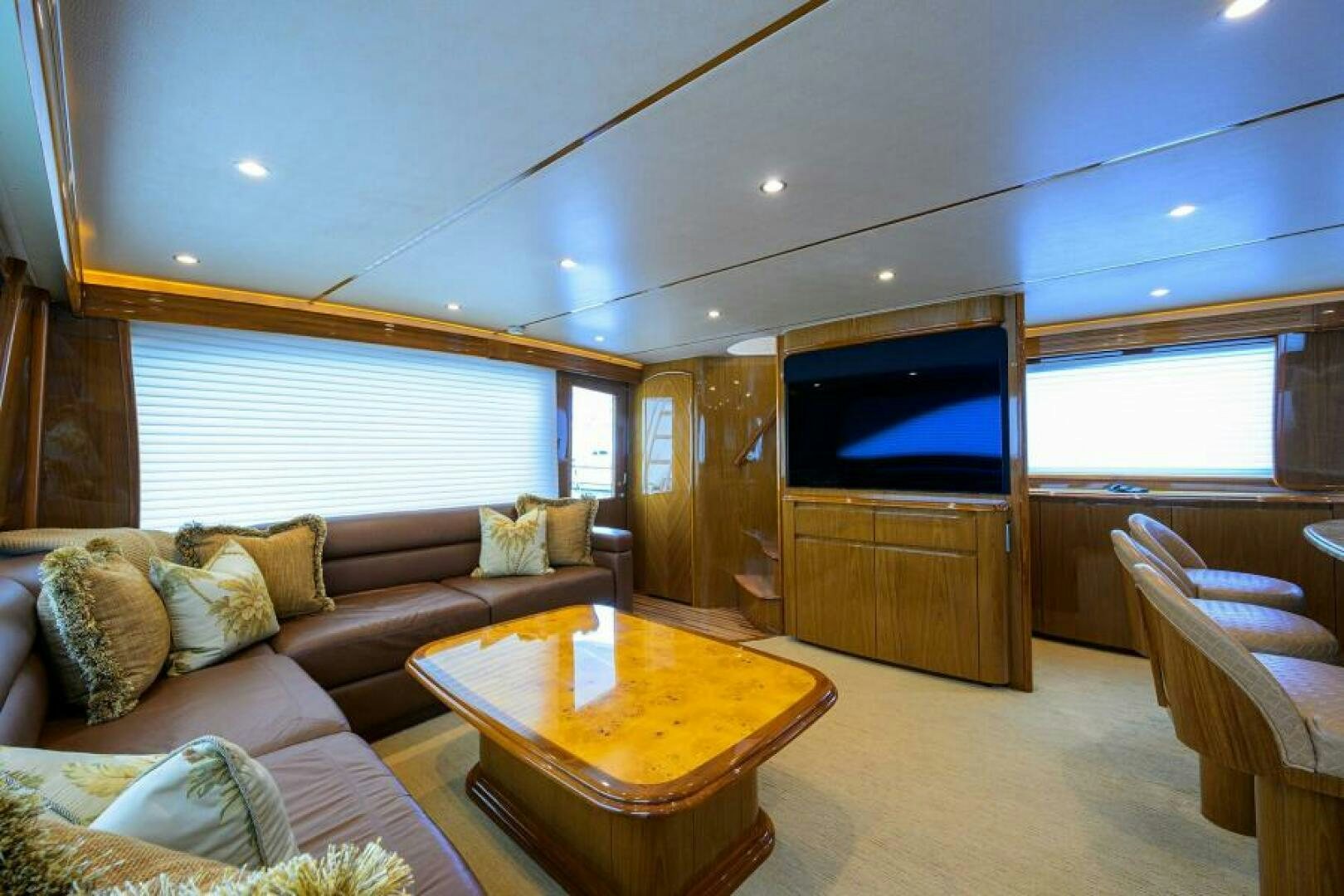 a living room with a couch and a tv aboard EGARIM Yacht for Sale