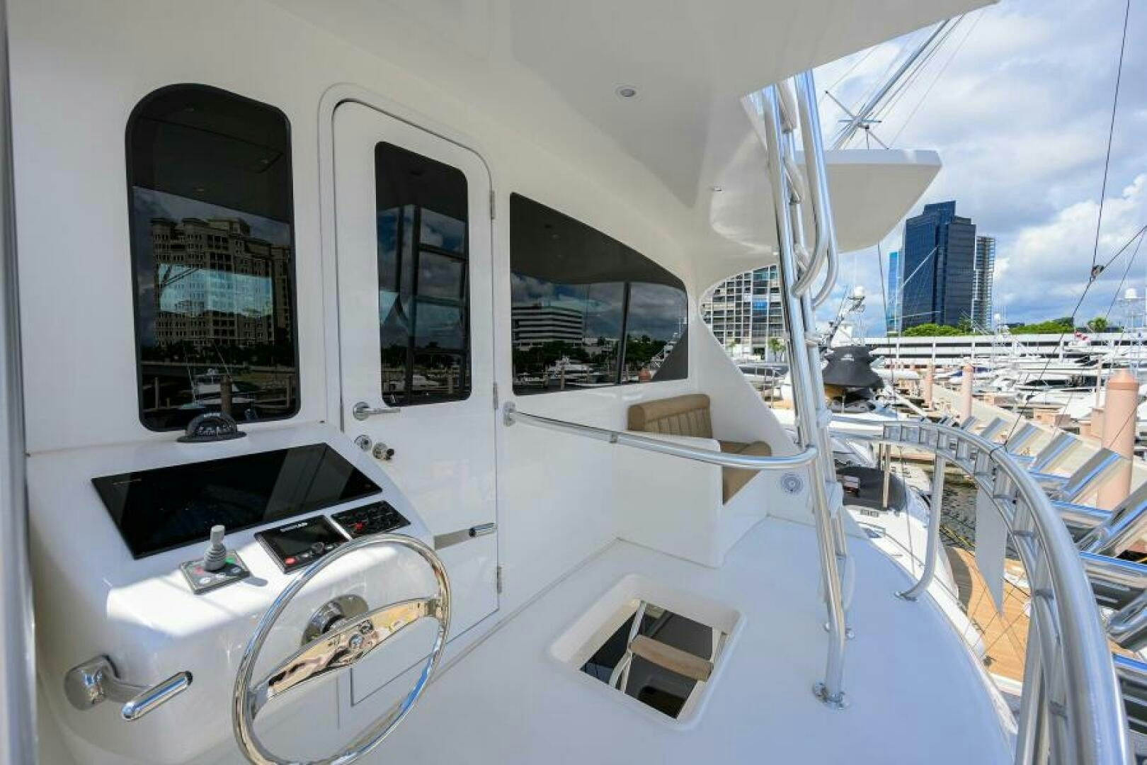 a white boat with windows aboard EGARIM Yacht for Sale