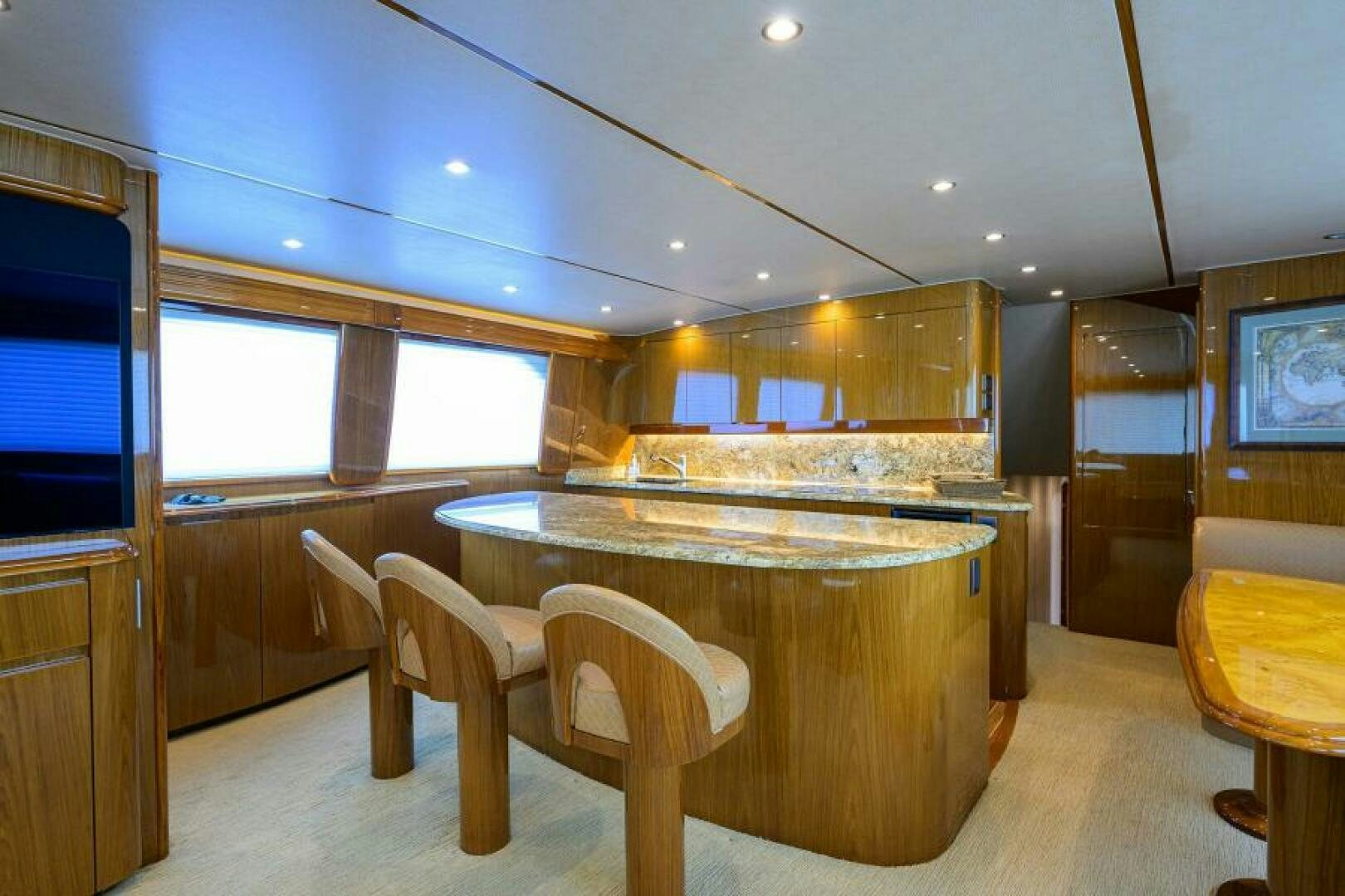 a large kitchen with a large island aboard EGARIM Yacht for Sale