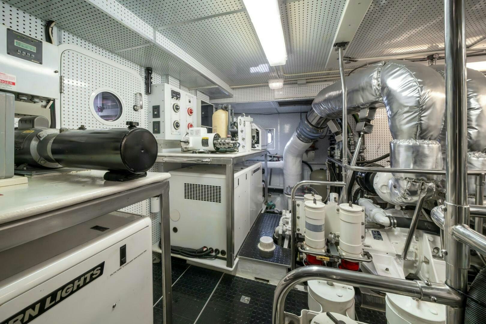 a room with machinery and equipment aboard BAD-LAD Yacht for Sale