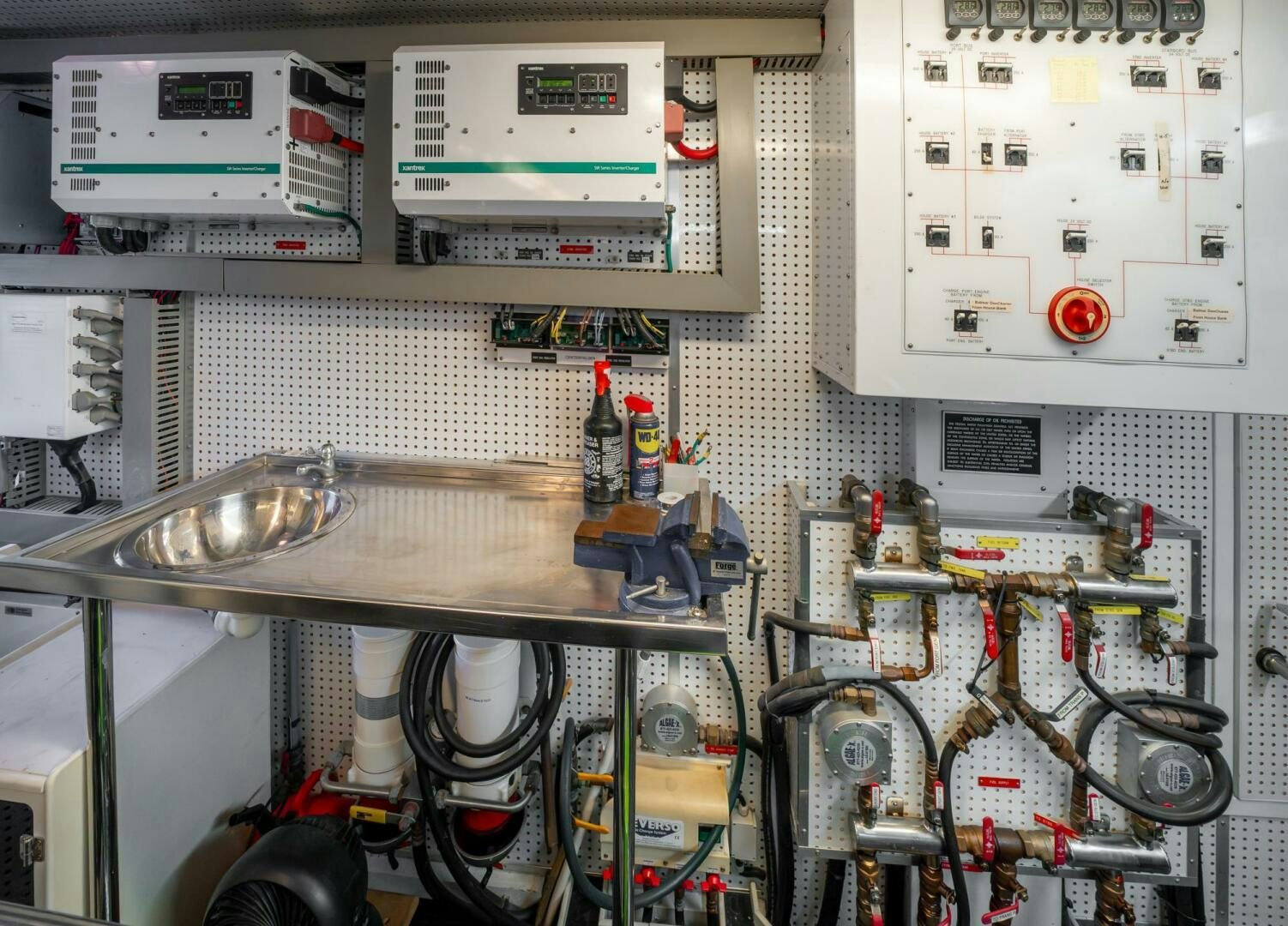 a room with machinery and equipment aboard BAD-LAD Yacht for Sale