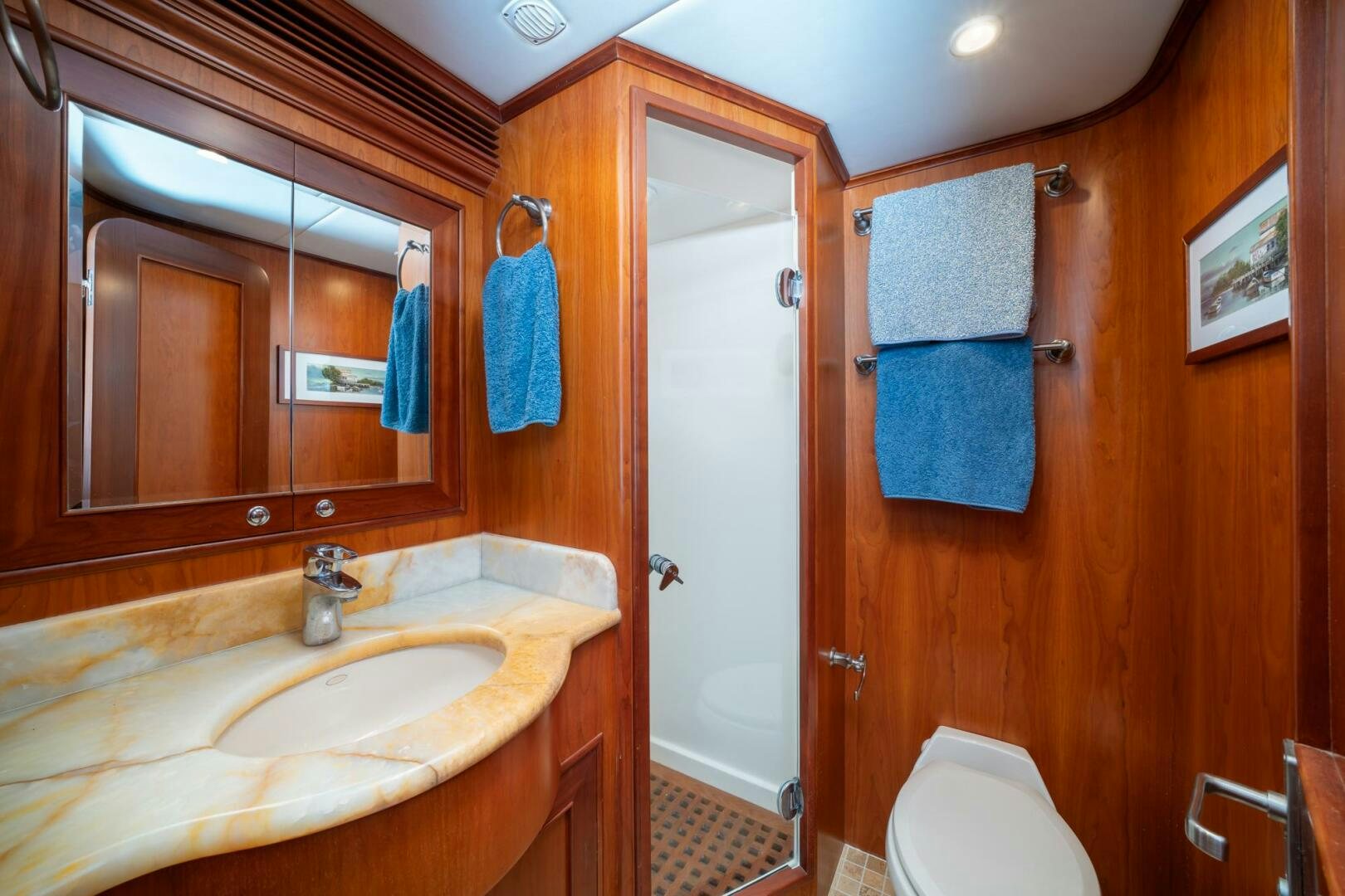 a bathroom with a sink and a toilet aboard BAD-LAD Yacht for Sale