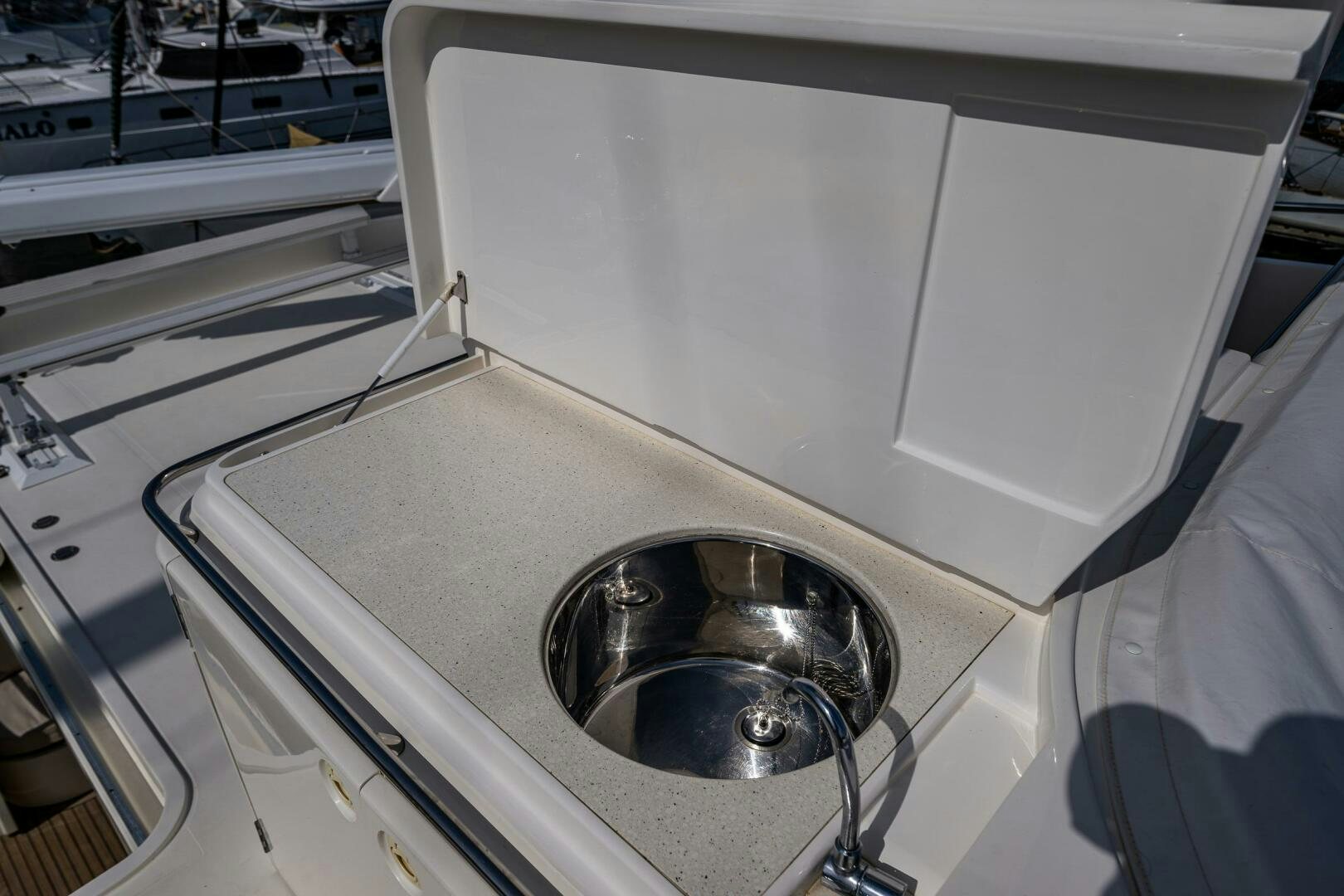 a silver sink in a room aboard PEARL Yacht for Sale