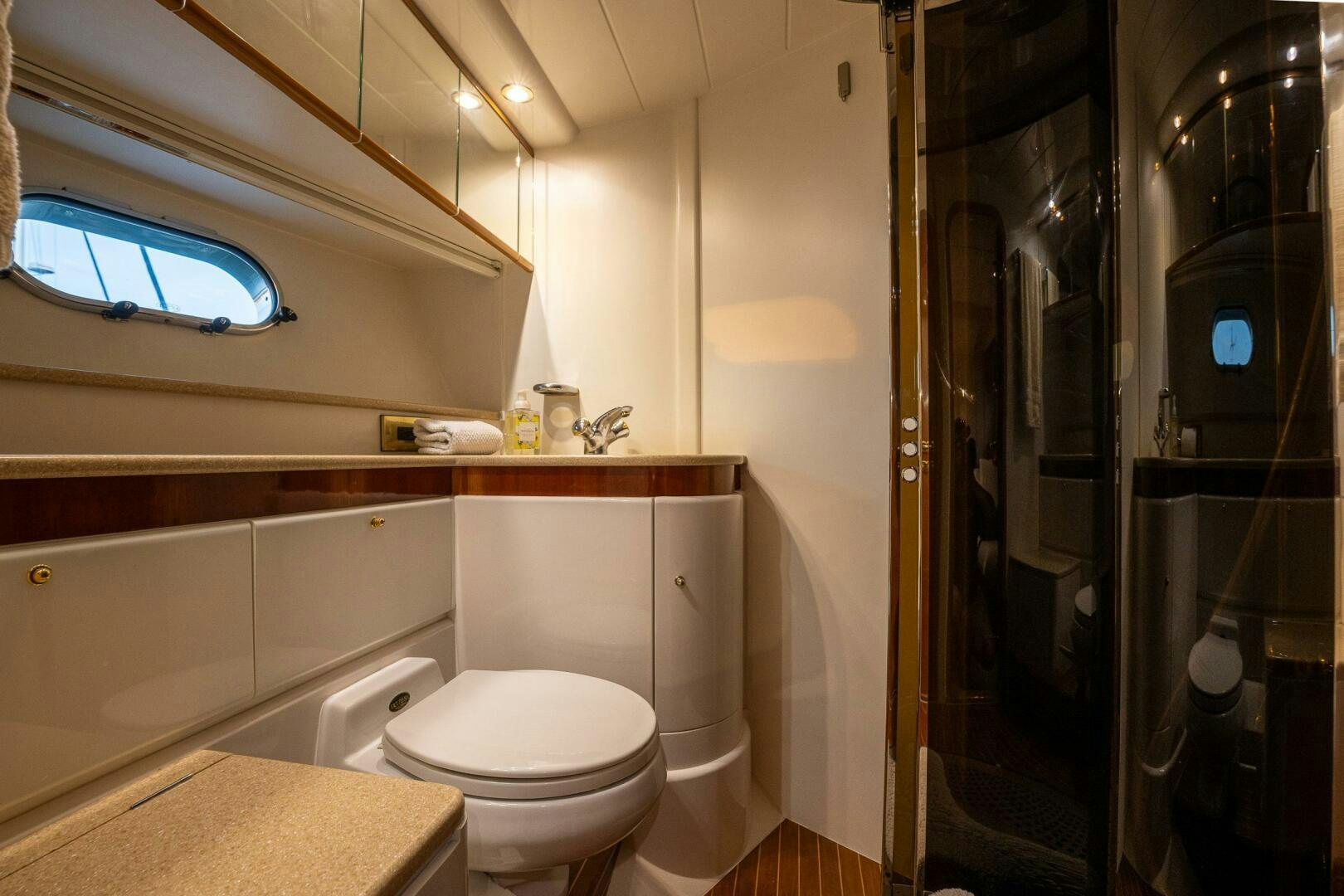 a bathroom with a glass shower aboard PEARL Yacht for Sale