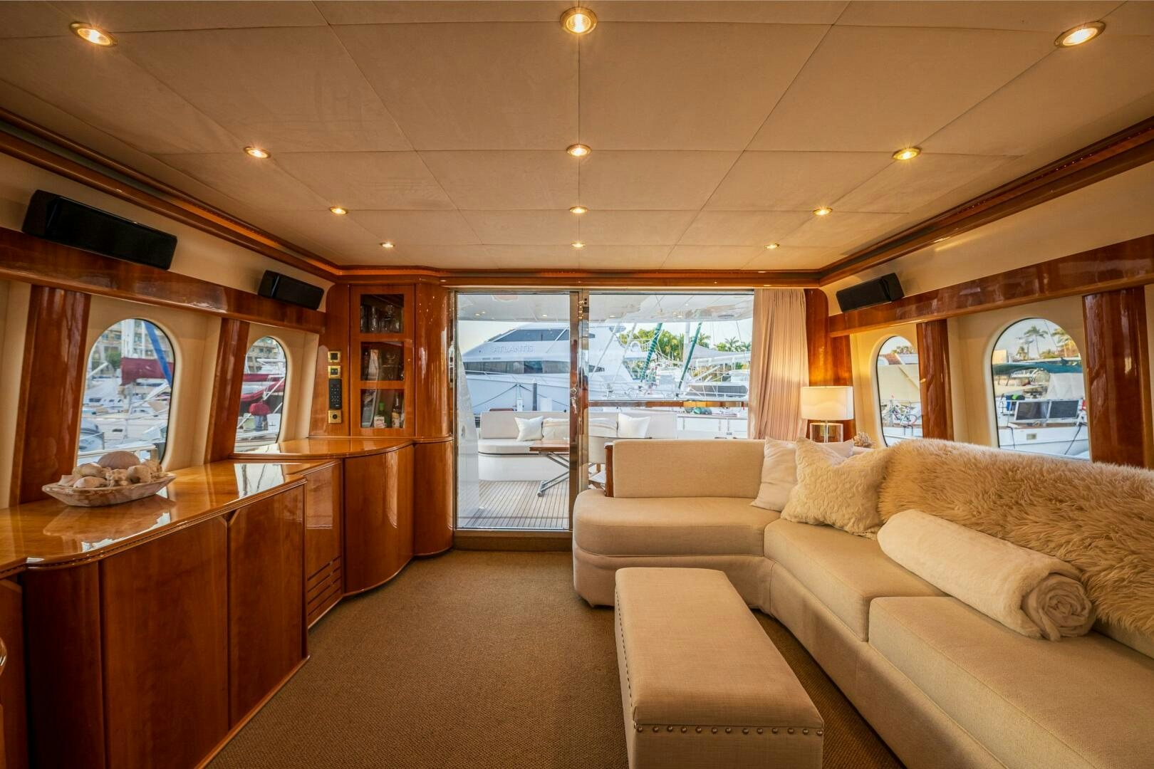 a living room with a large window aboard PEARL Yacht for Sale